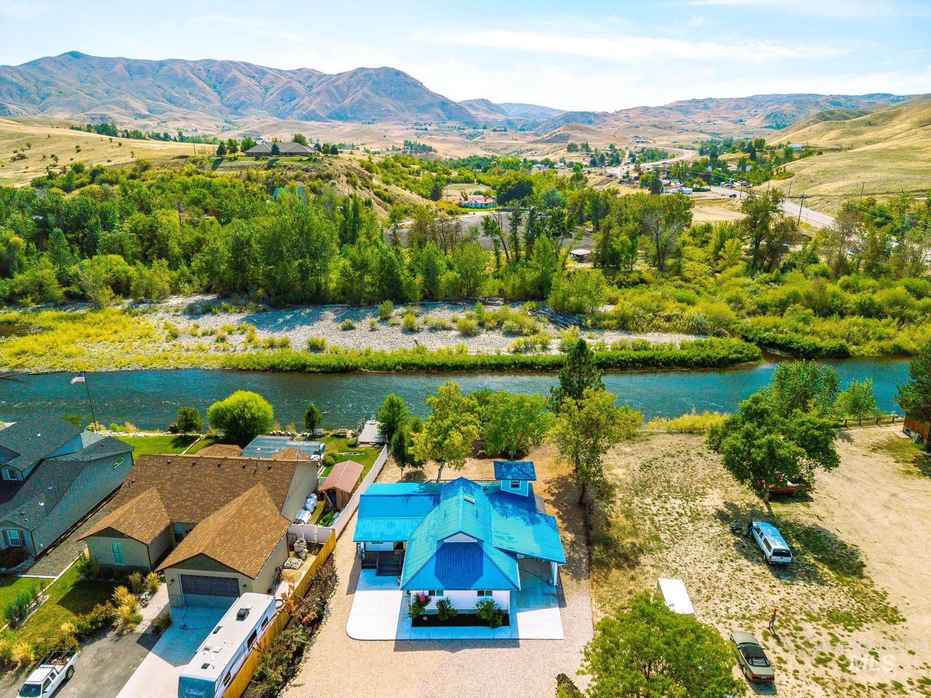 View of rural area with a water and mountain view