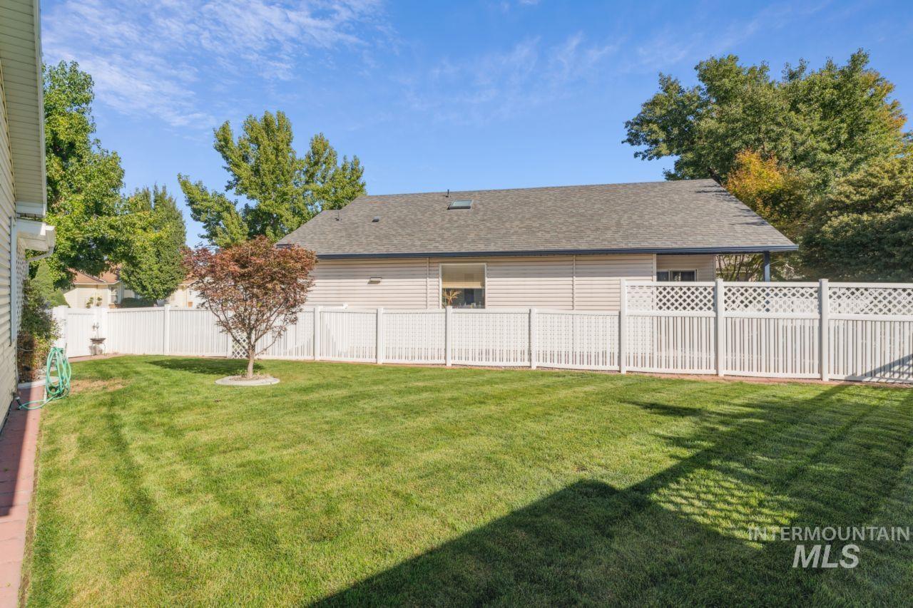 View of fenced backyard