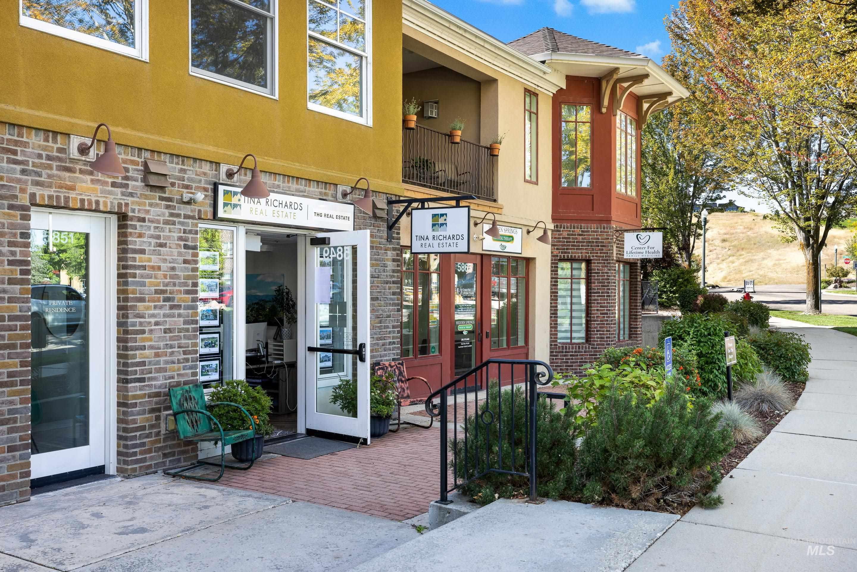 Doorway to property with stucco siding