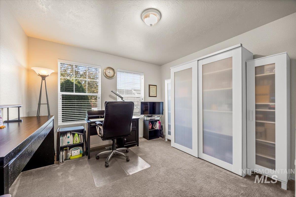Sunlit office space perfect for productivity and focus or 3rd bedroom.