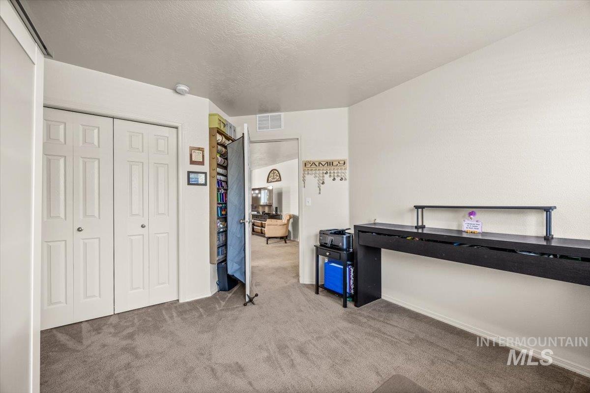 Versatile bedroom or office ready for your creative touch.