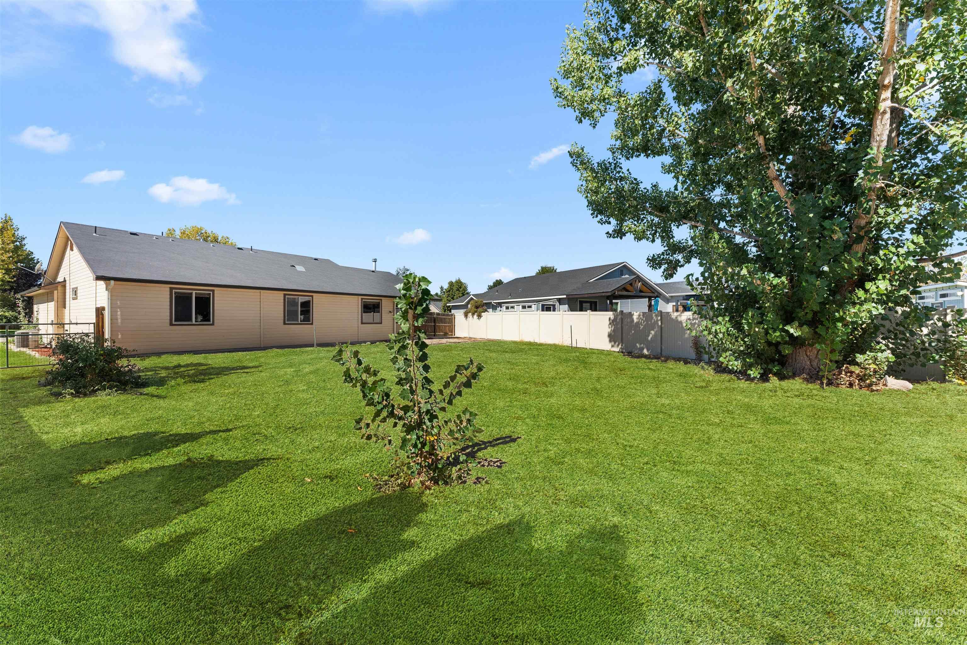 View of fenced backyard