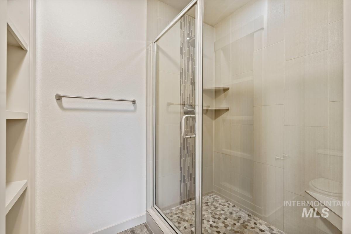 Bathroom featuring a stall shower
