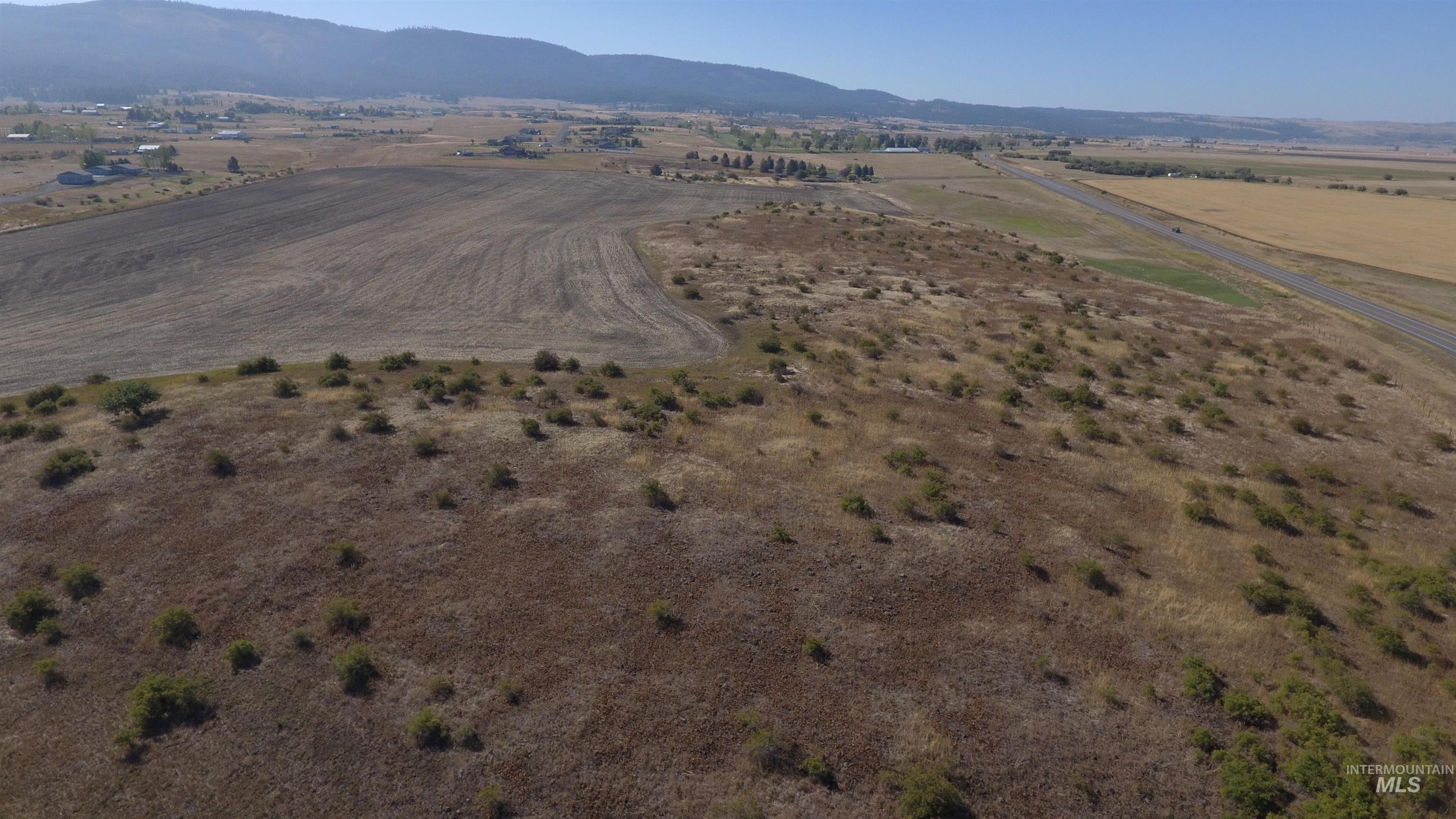View of property location featuring rural landscape and a mountain backdrop