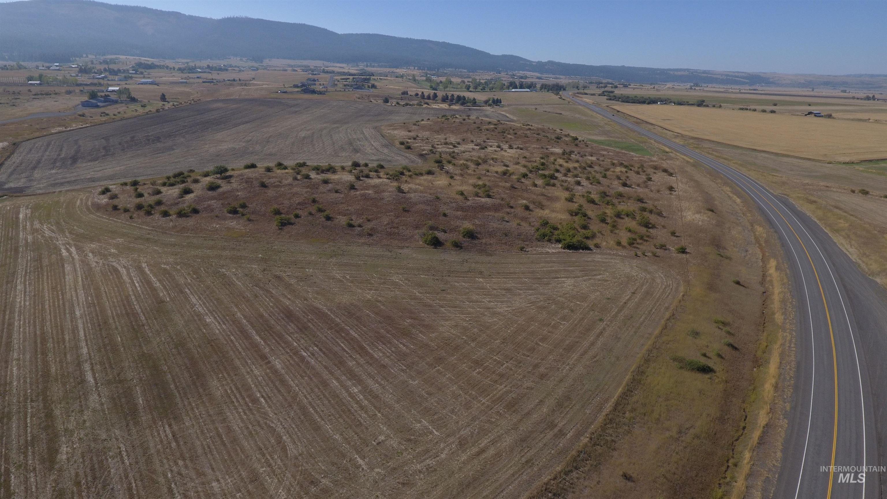 View of property location featuring rural landscape and a mountain backdrop