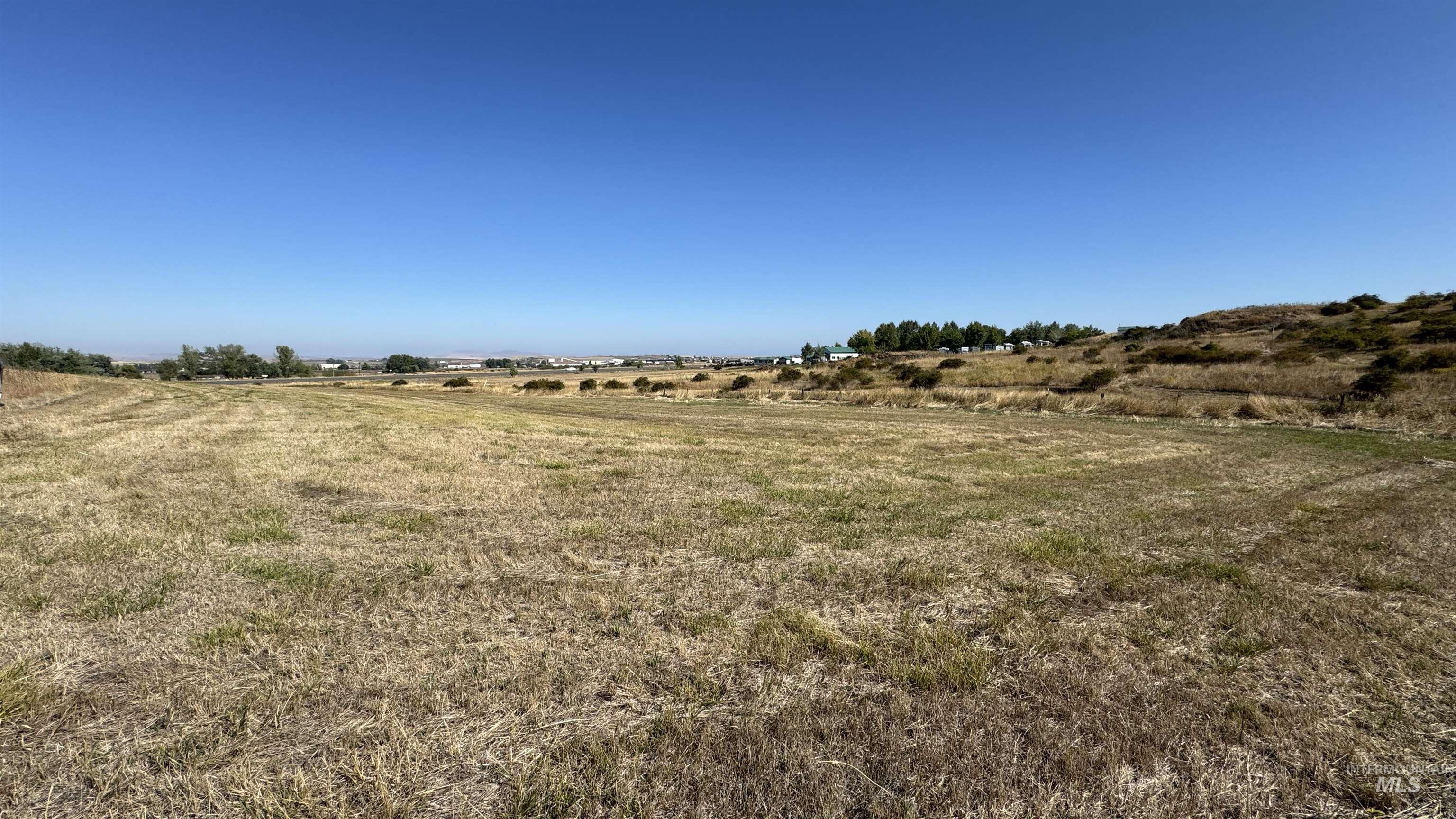 View of yard with a view of countryside
