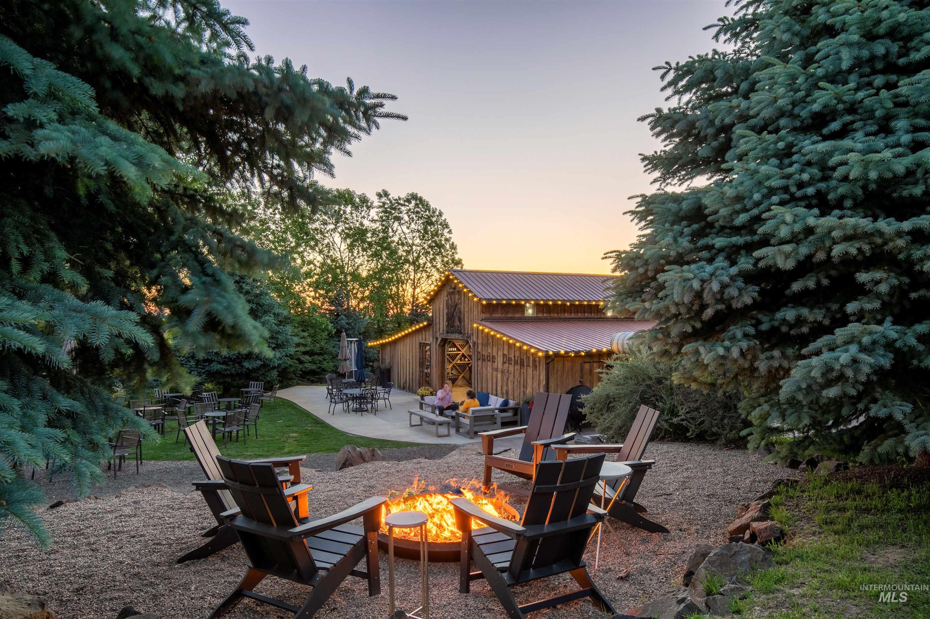 View of patio / terrace with an outdoor fire pit
