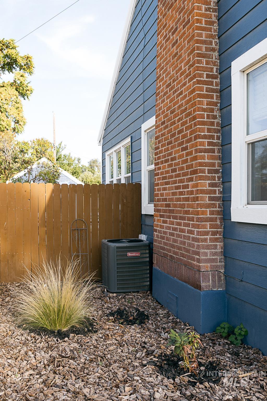 View of home's exterior featuring a central air condition unit and crawl space