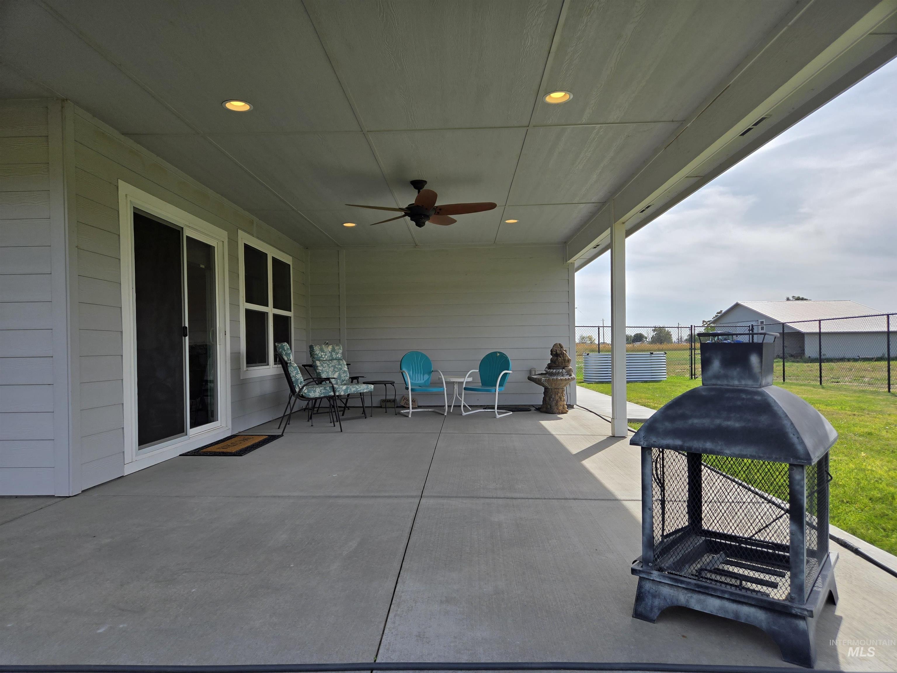 View of patio / terrace featuring a ceiling fan
