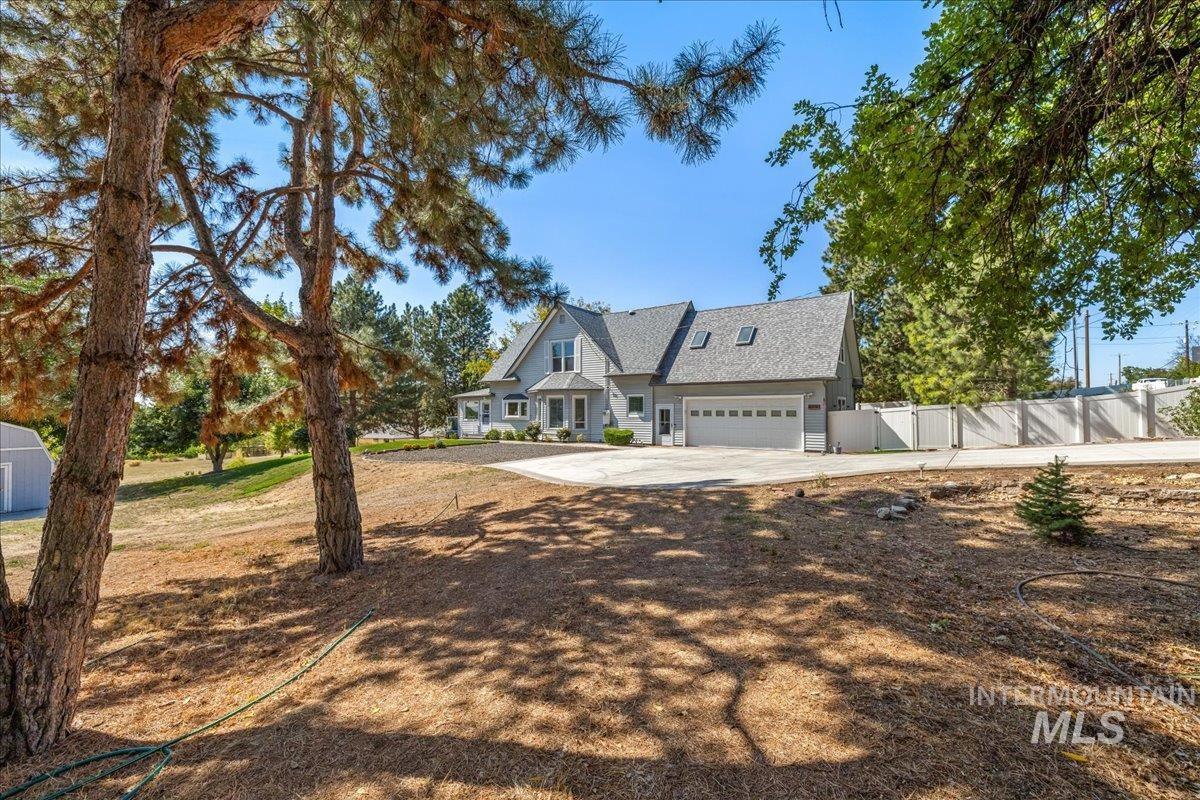 View of front of property featuring driveway