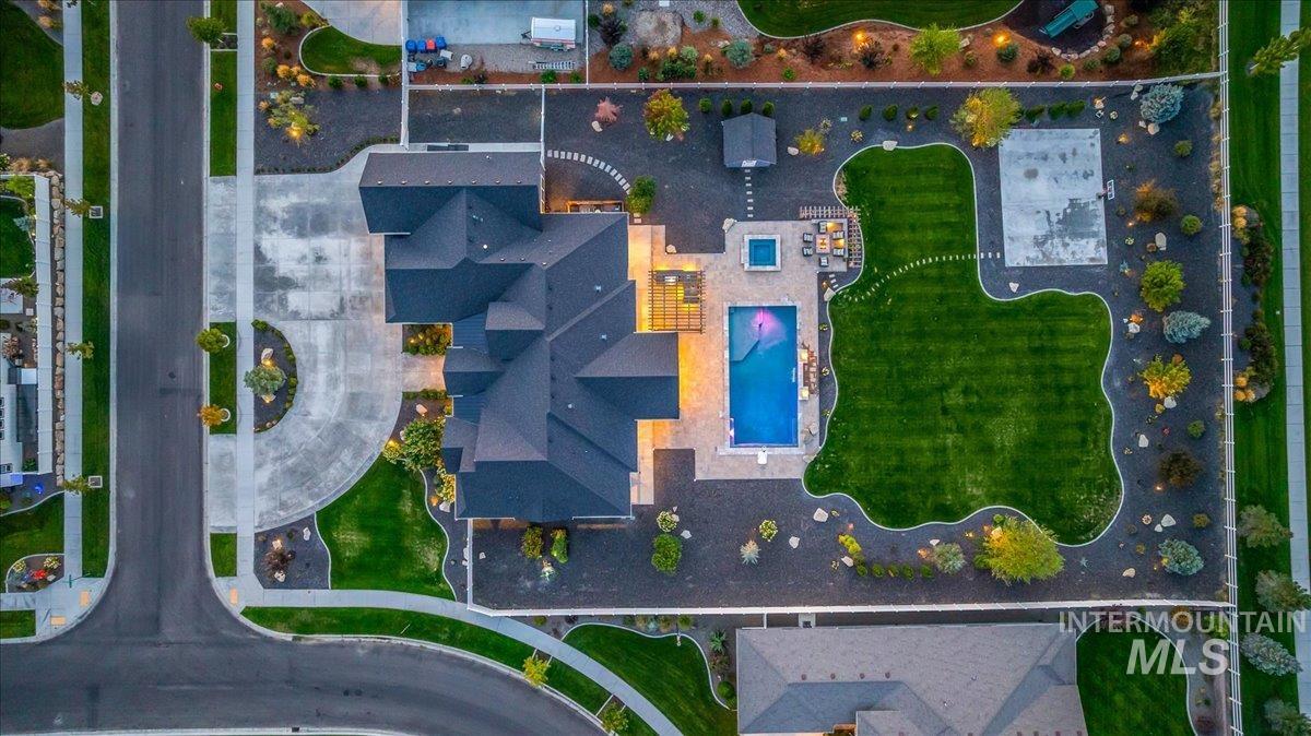 Aerial view of property's location featuring a pool area