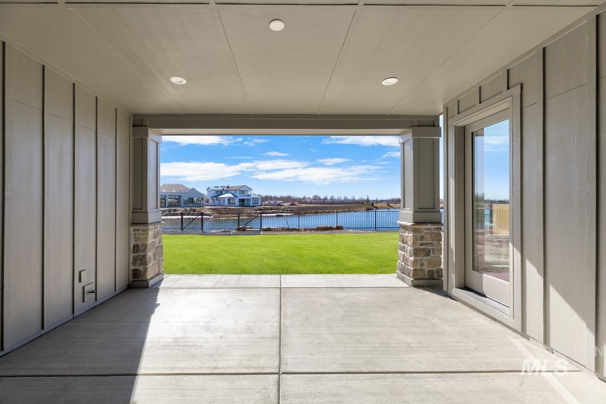 View of patio / terrace featuring a water view