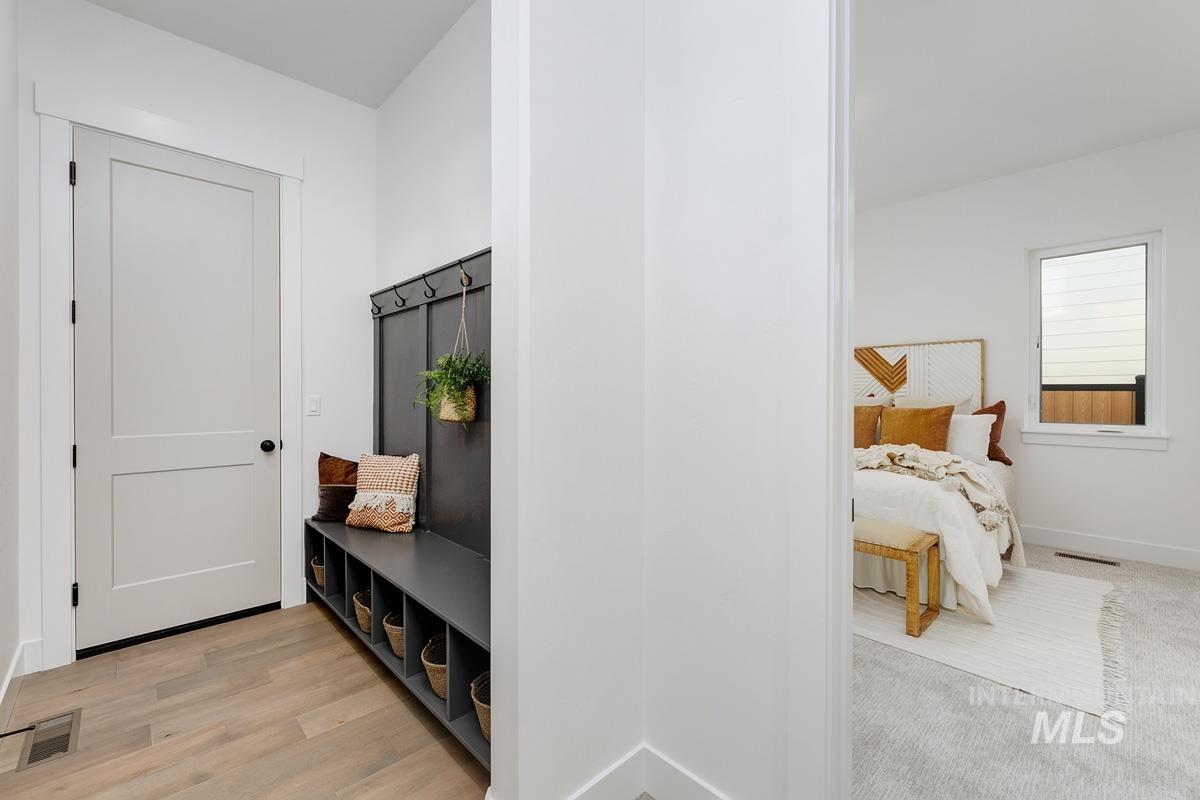 Mudroom featuring baseboards