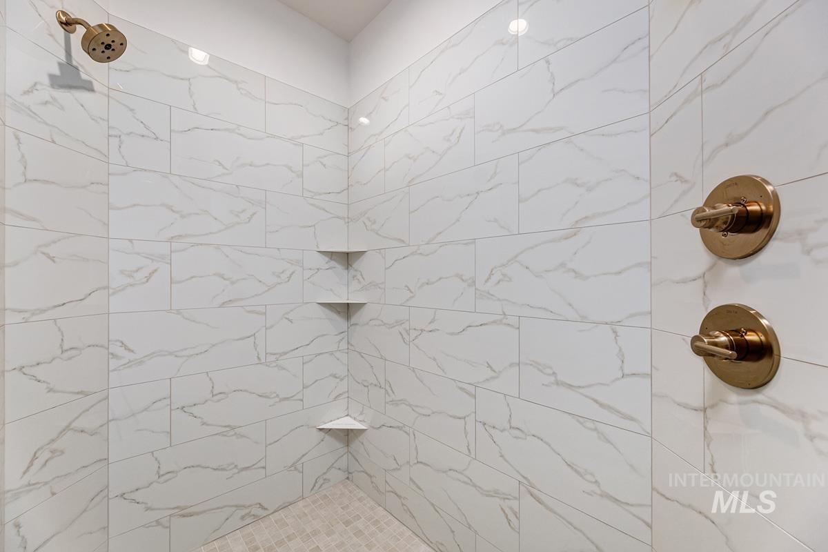 Bathroom with a tile shower