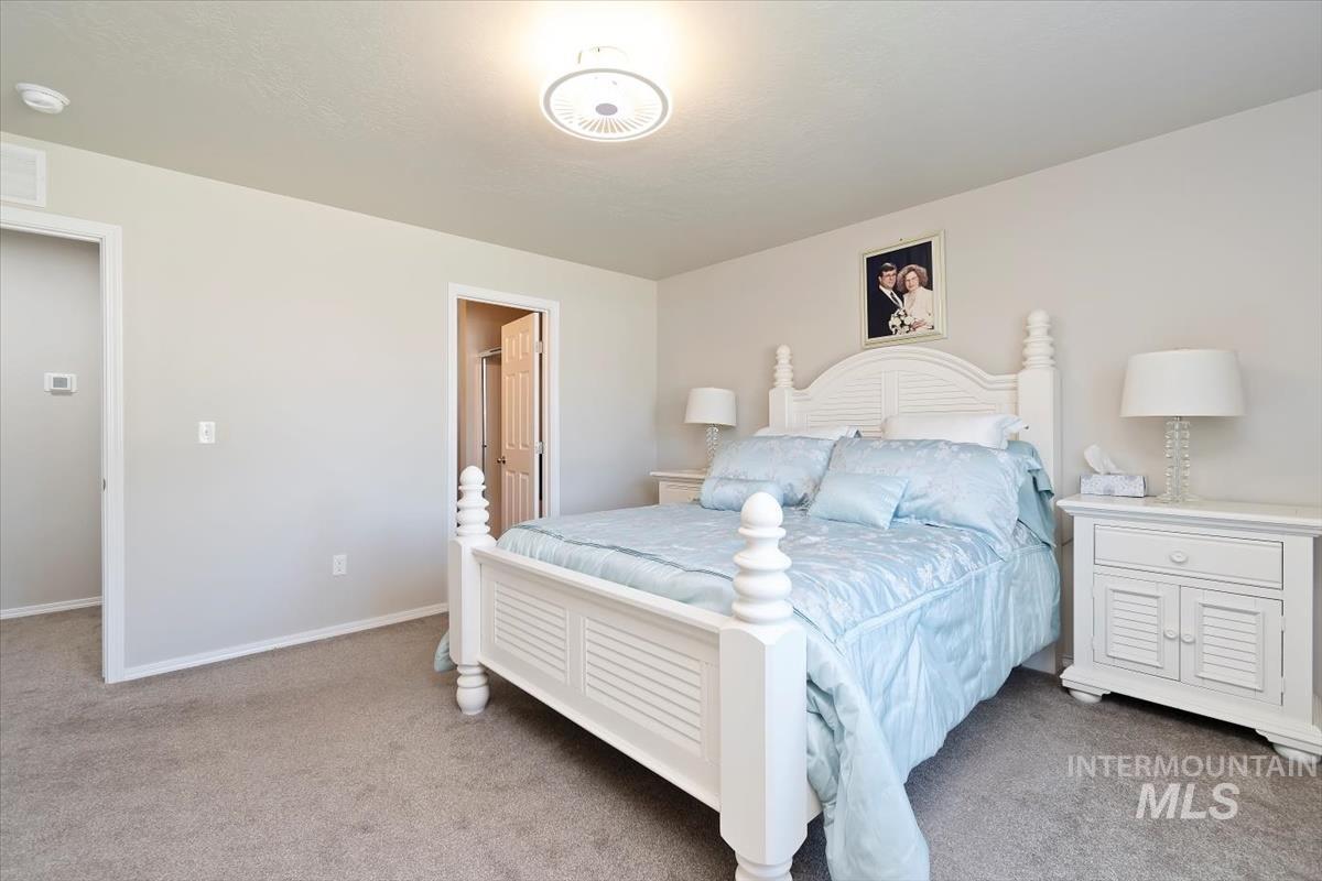Bedroom with carpet flooring