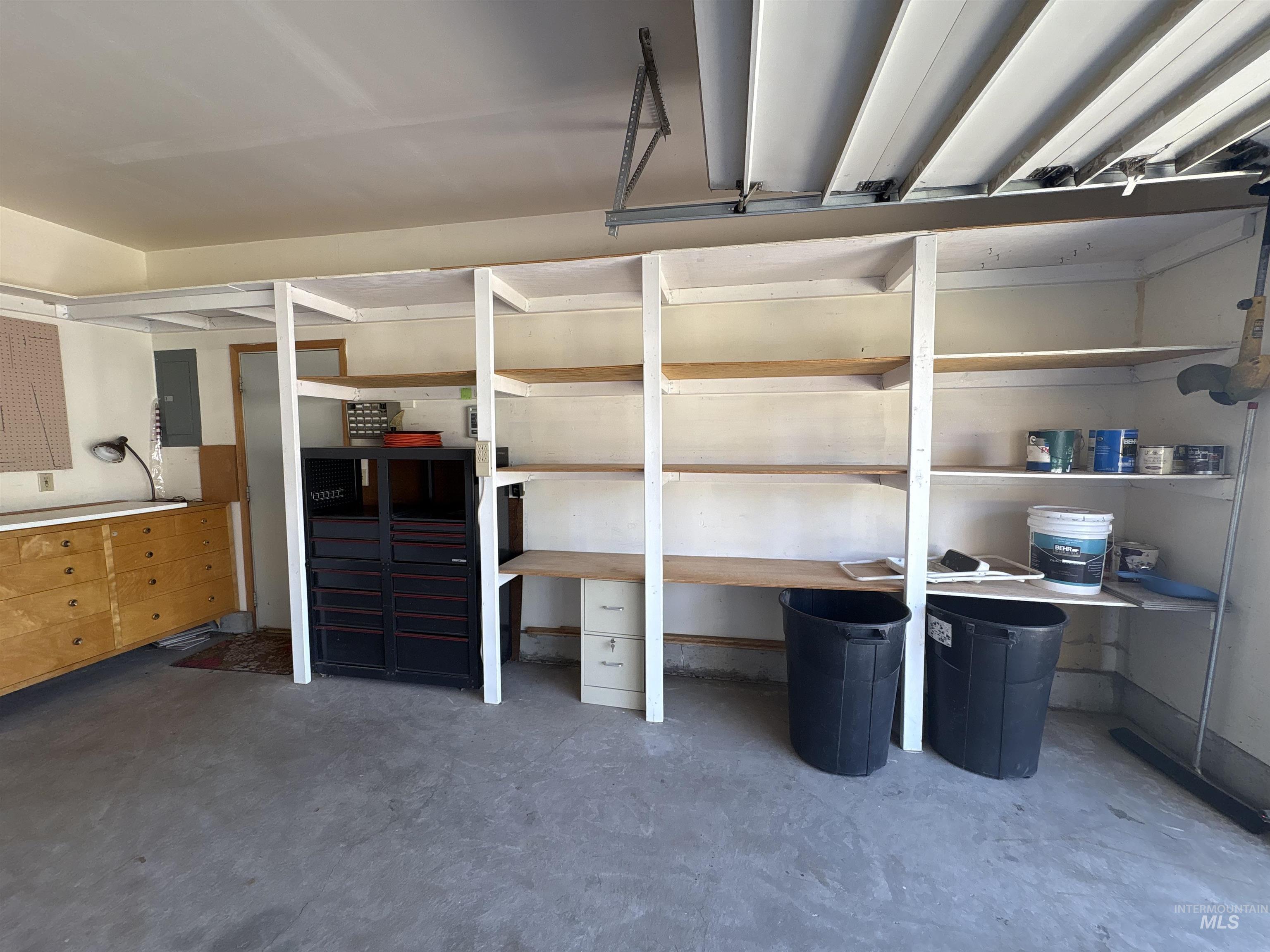 Storage room featuring electric panel