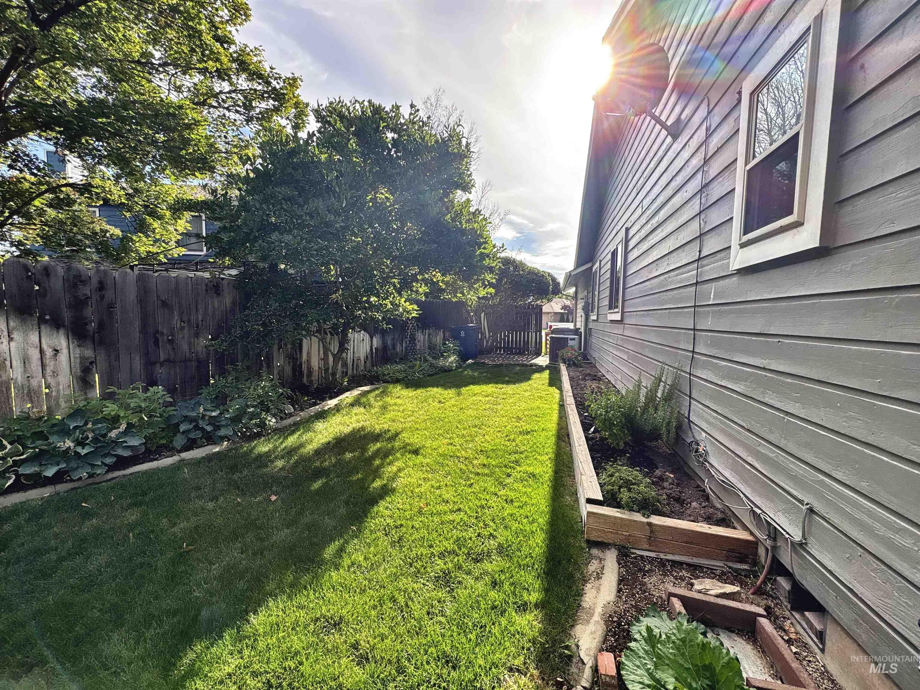 View of yard with a vegetable garden