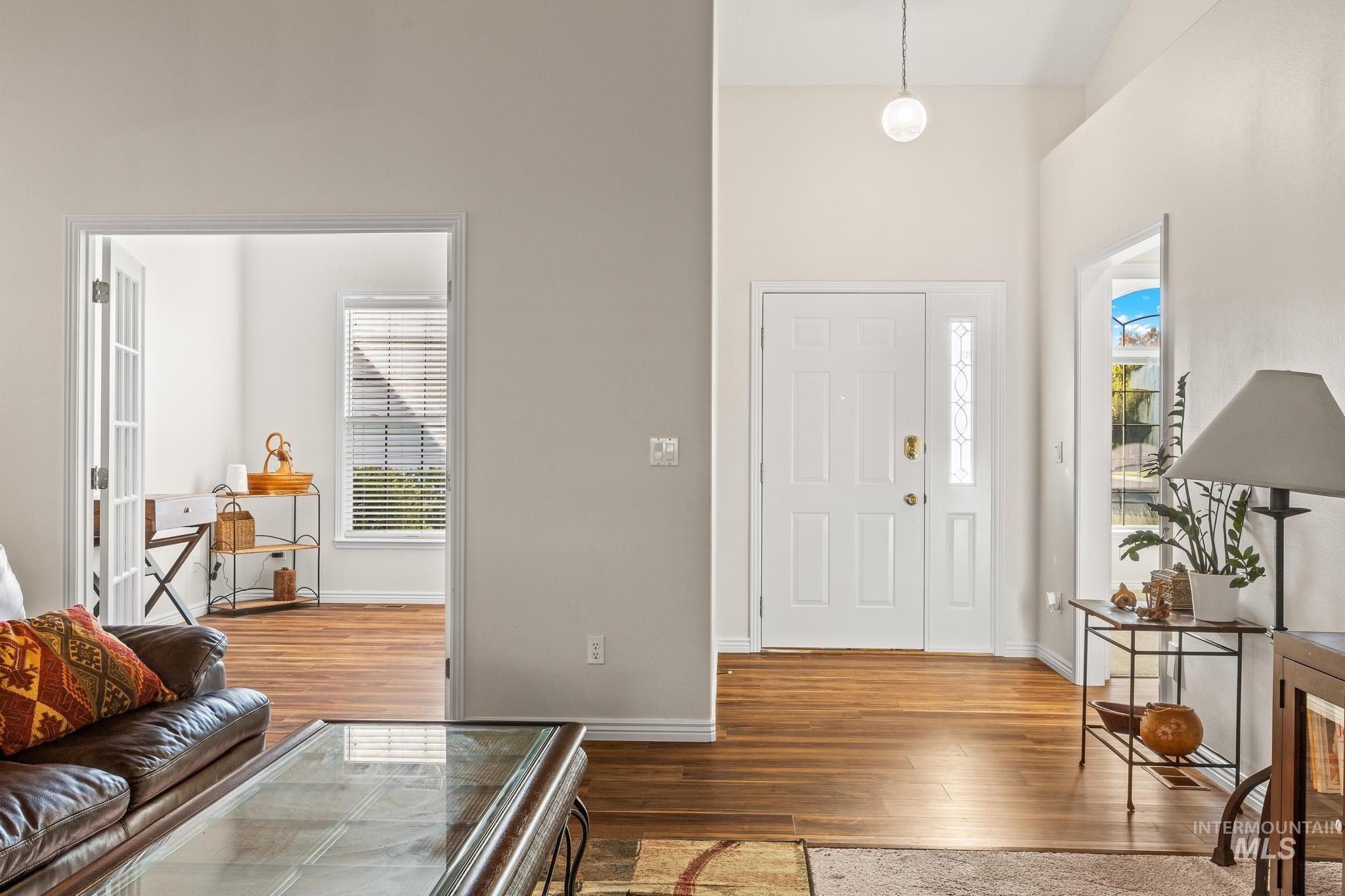 Foyer featuring wood finished floors