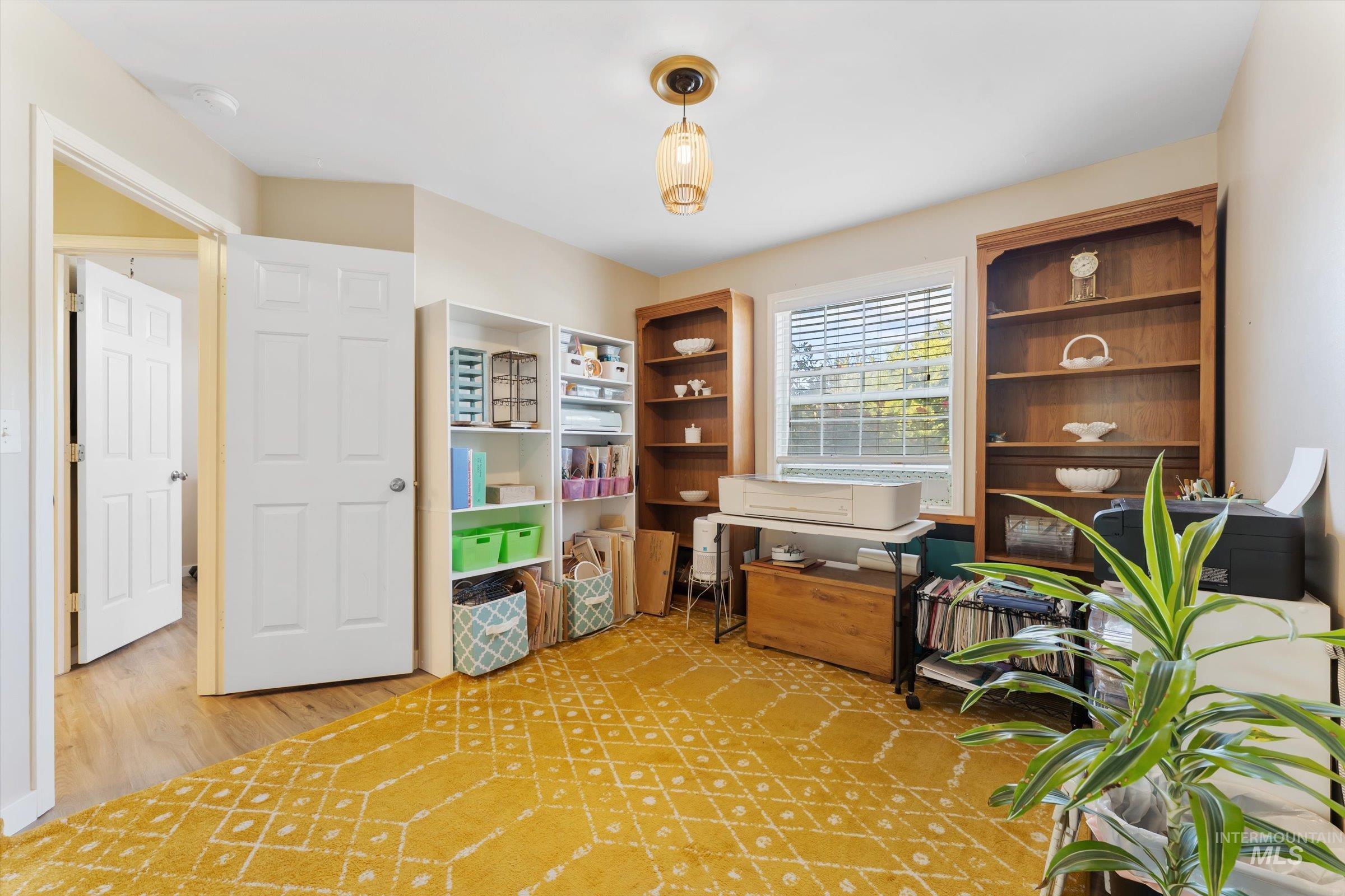 Office space featuring light wood finished floors