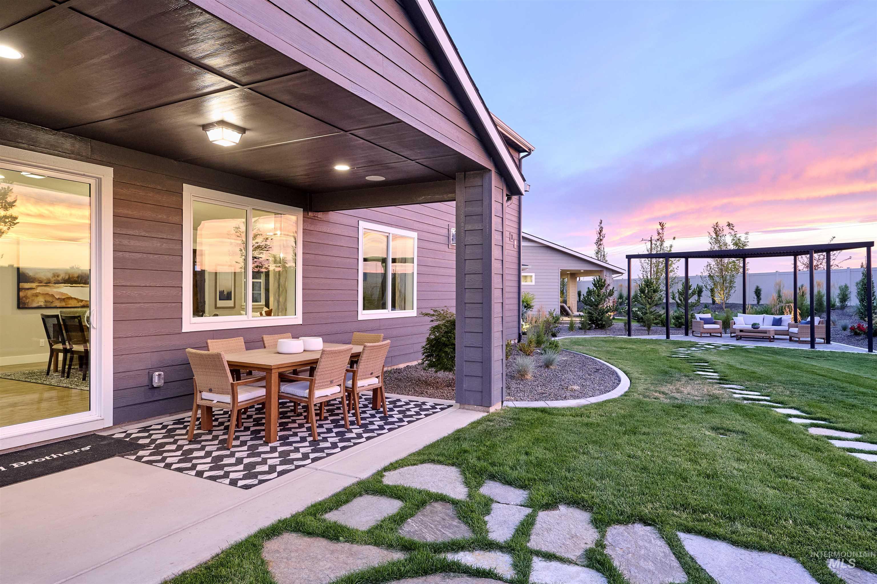 View of patio featuring outdoor dining space and an outdoor hangout area