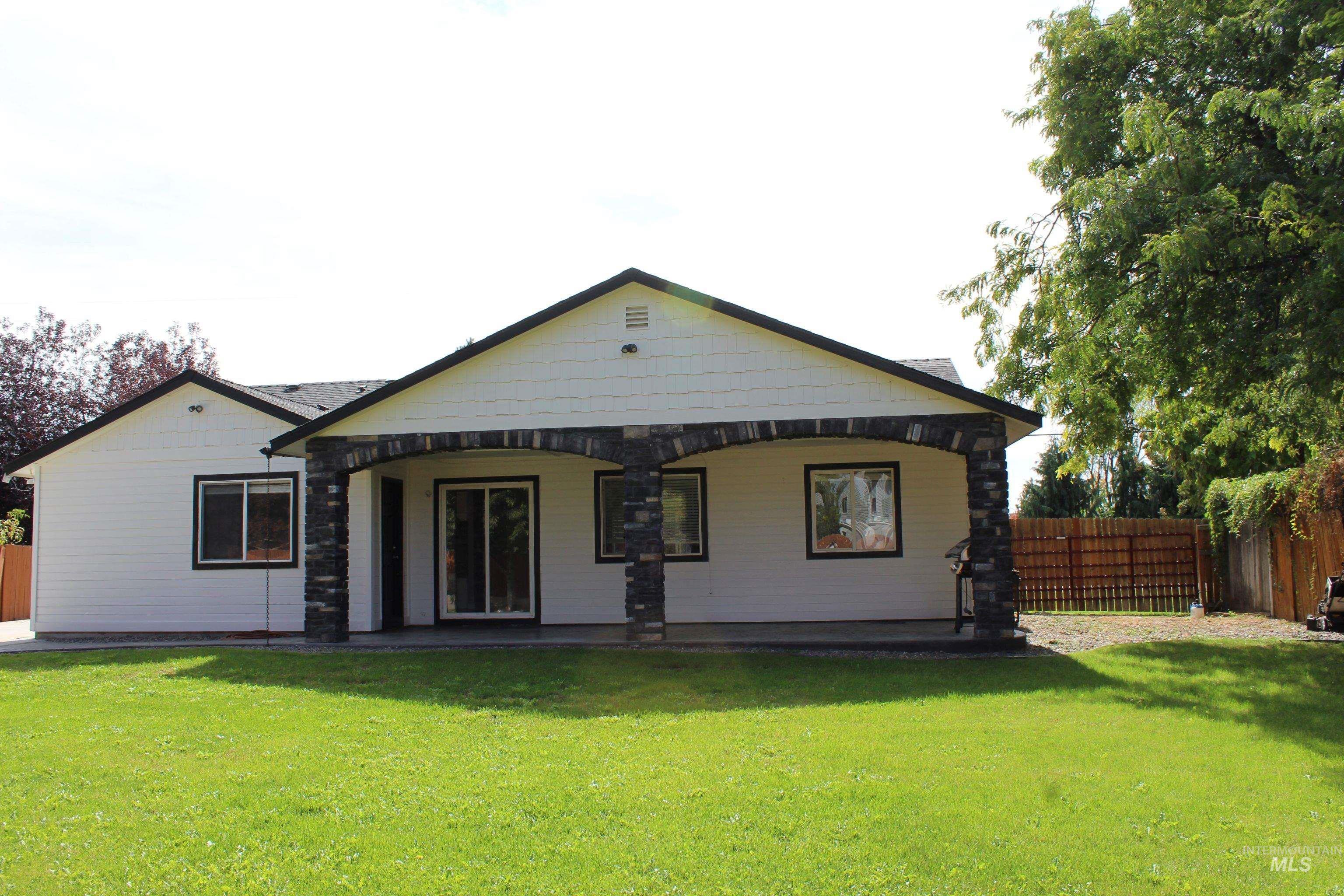 Back of property with a patio area