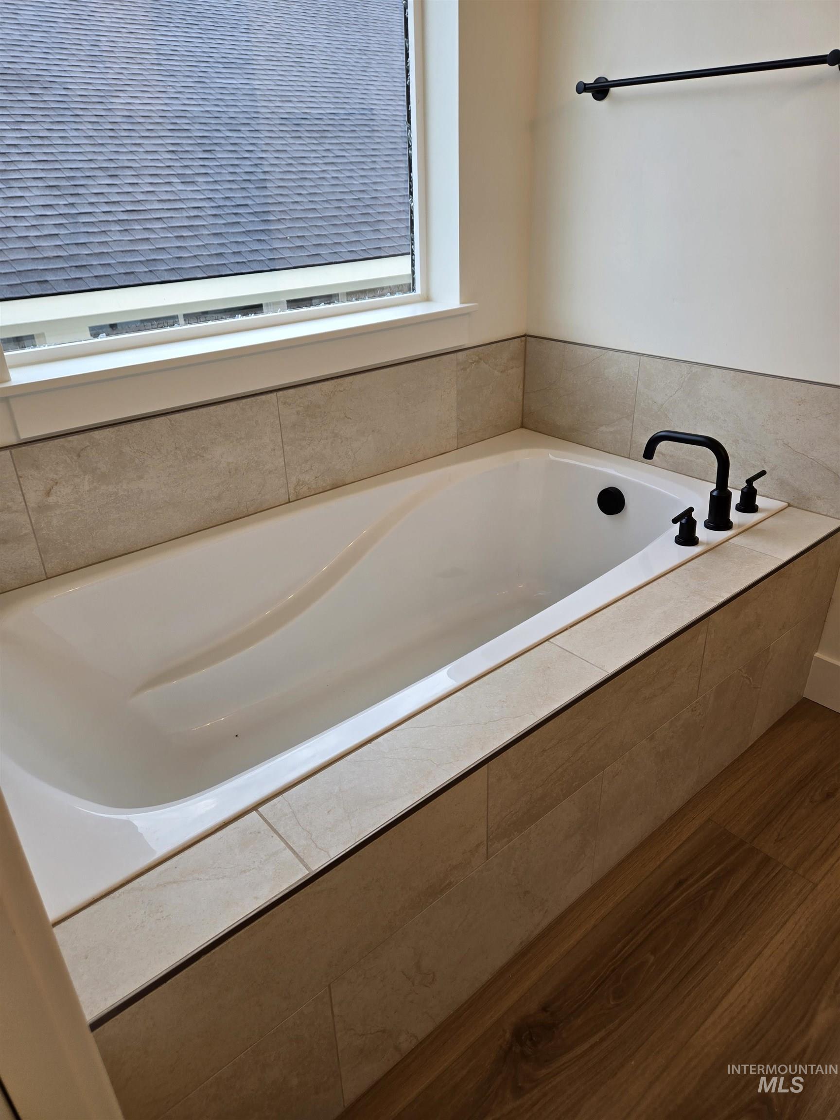 Full bath with a bath