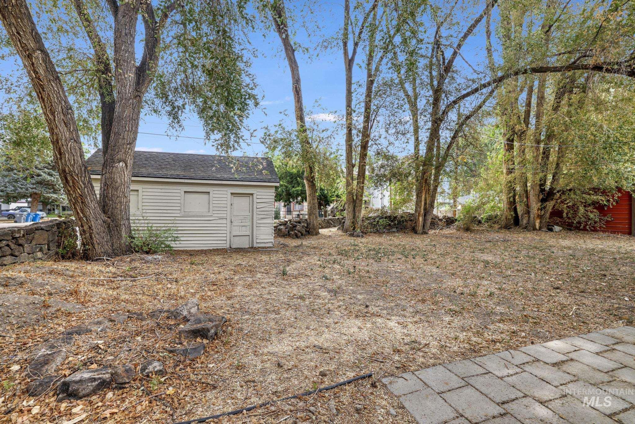 View of yard with an outbuilding