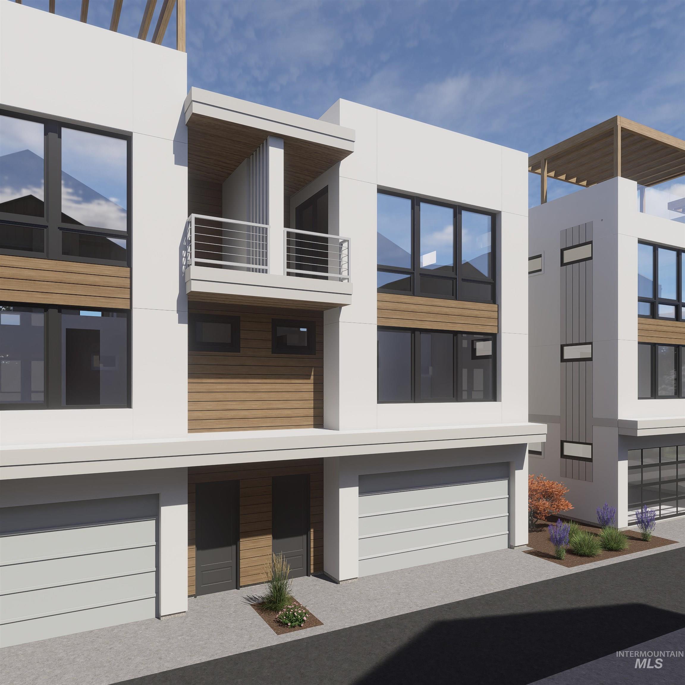 View of property featuring a garage