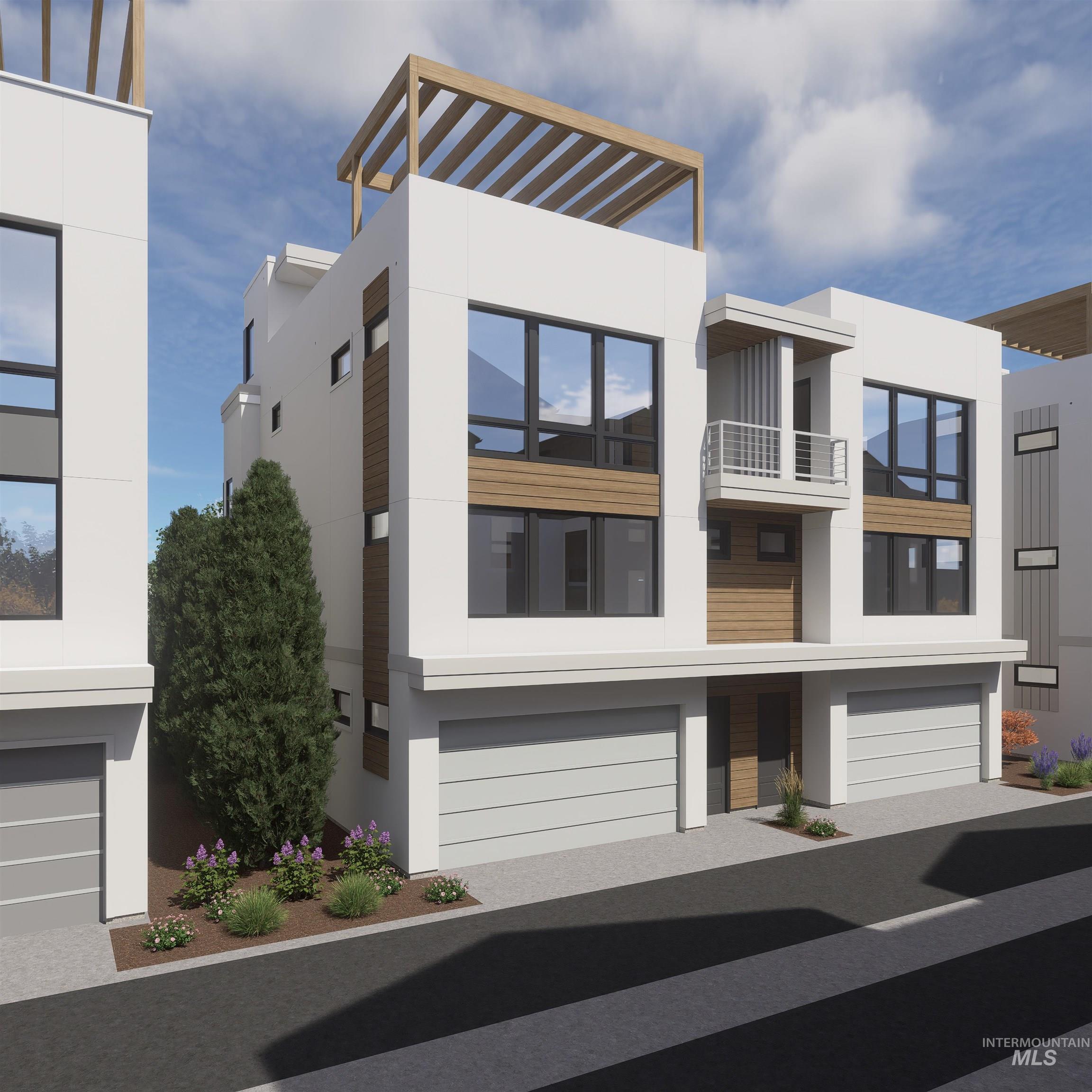 Modern home with stucco siding and an attached garage
