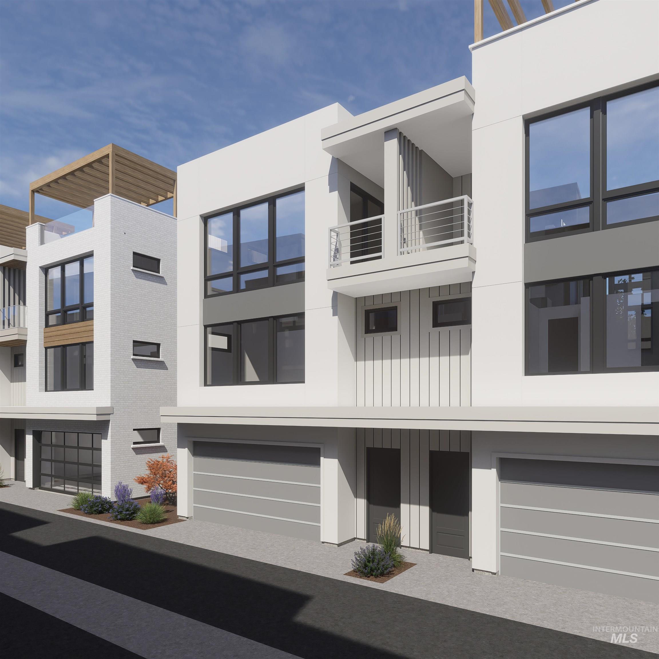 View of property with a garage