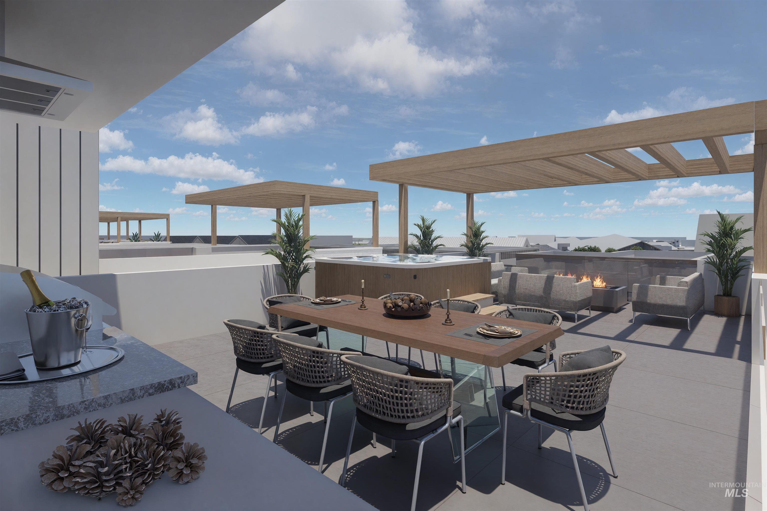 View of patio featuring an outdoor living space with a fire pit and outdoor dining area