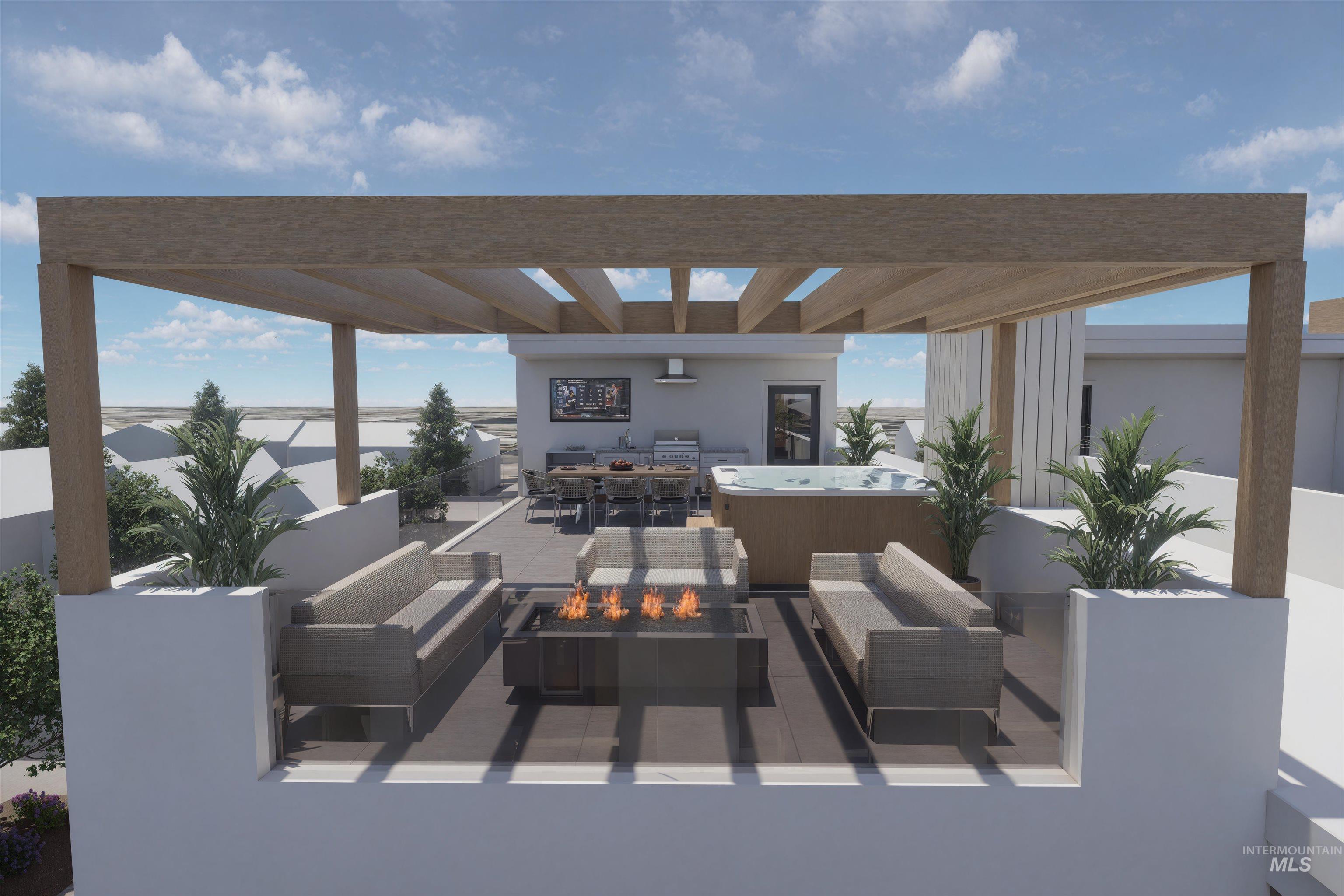 View of patio with an outdoor living space with a fire pit and grilling area