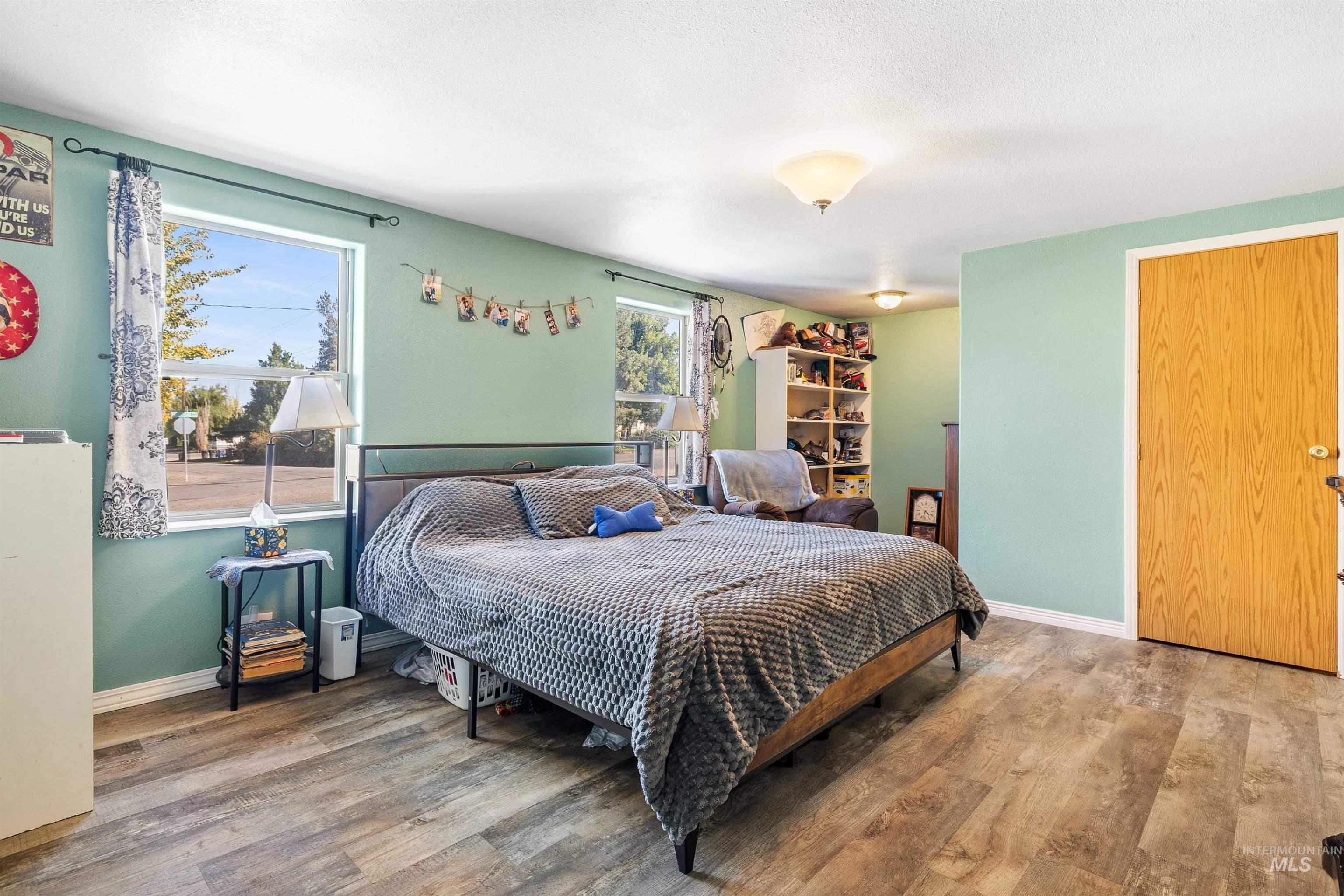 Bedroom with wood finished floors