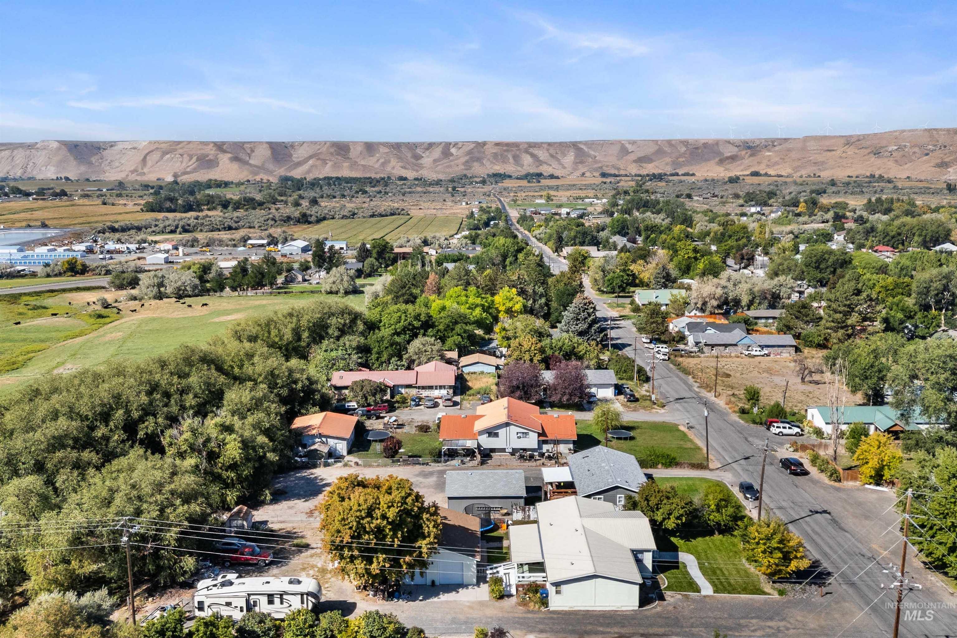 Aerial view of residential area featuring mountains