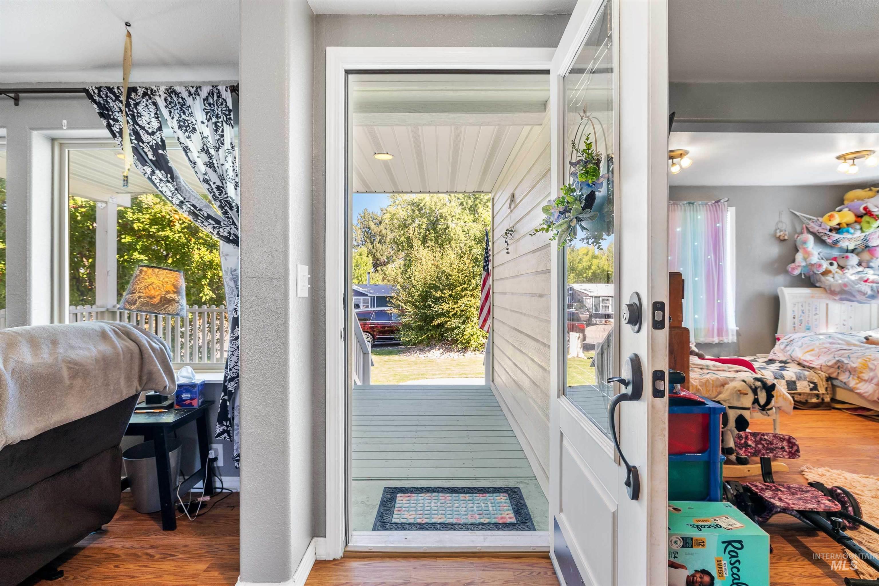 Entryway featuring wood finished floors