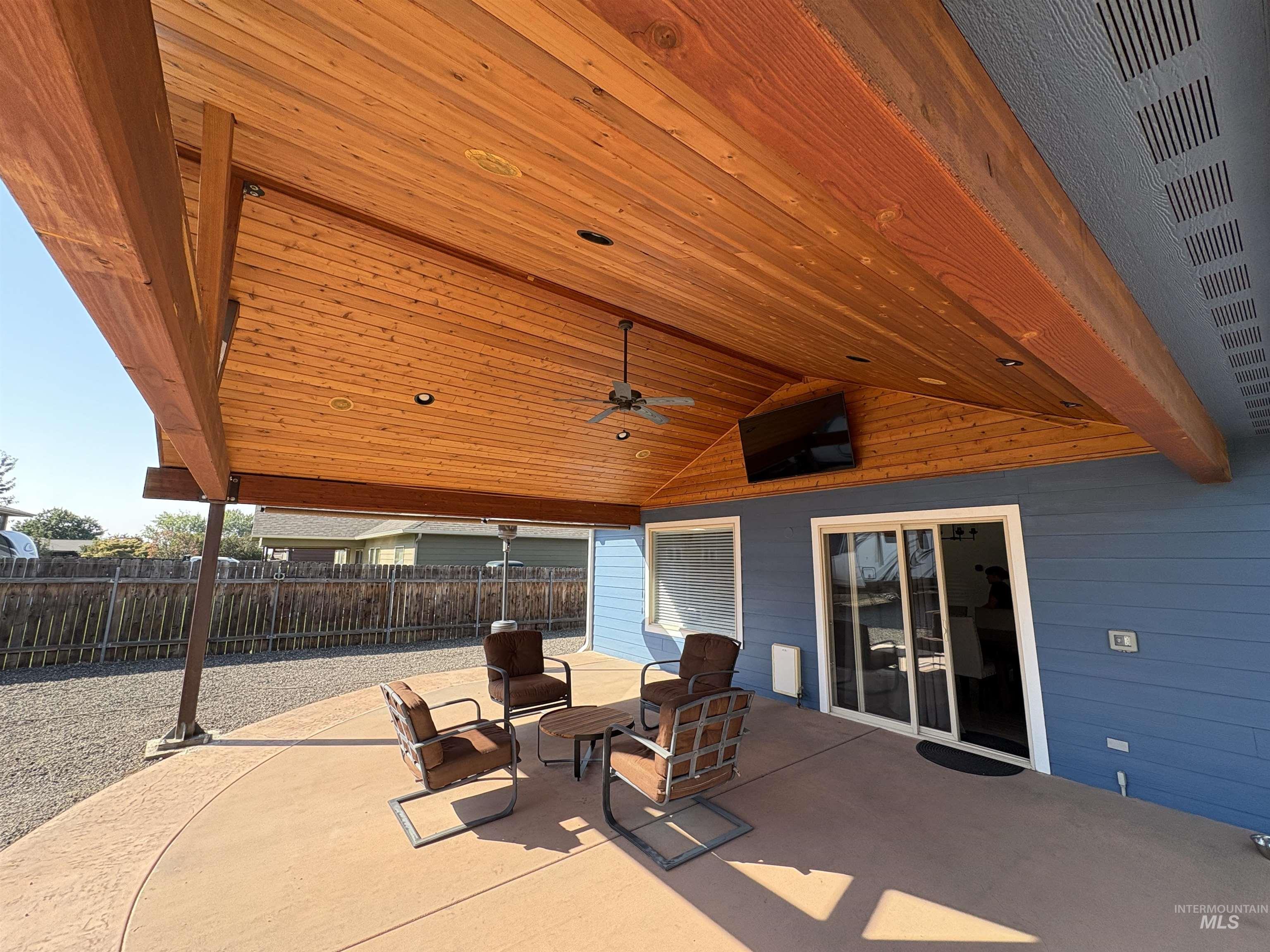 View of patio / terrace with a ceiling fan