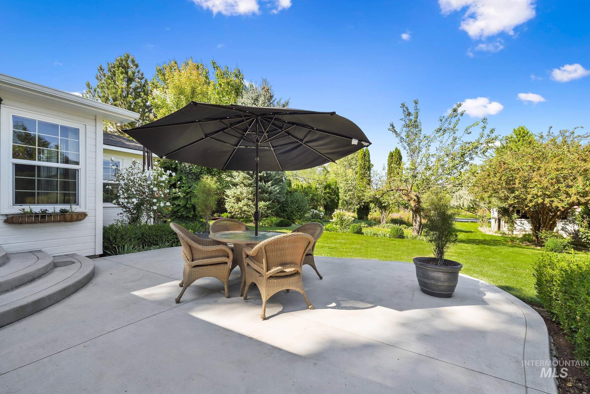 View of patio with outdoor dining space