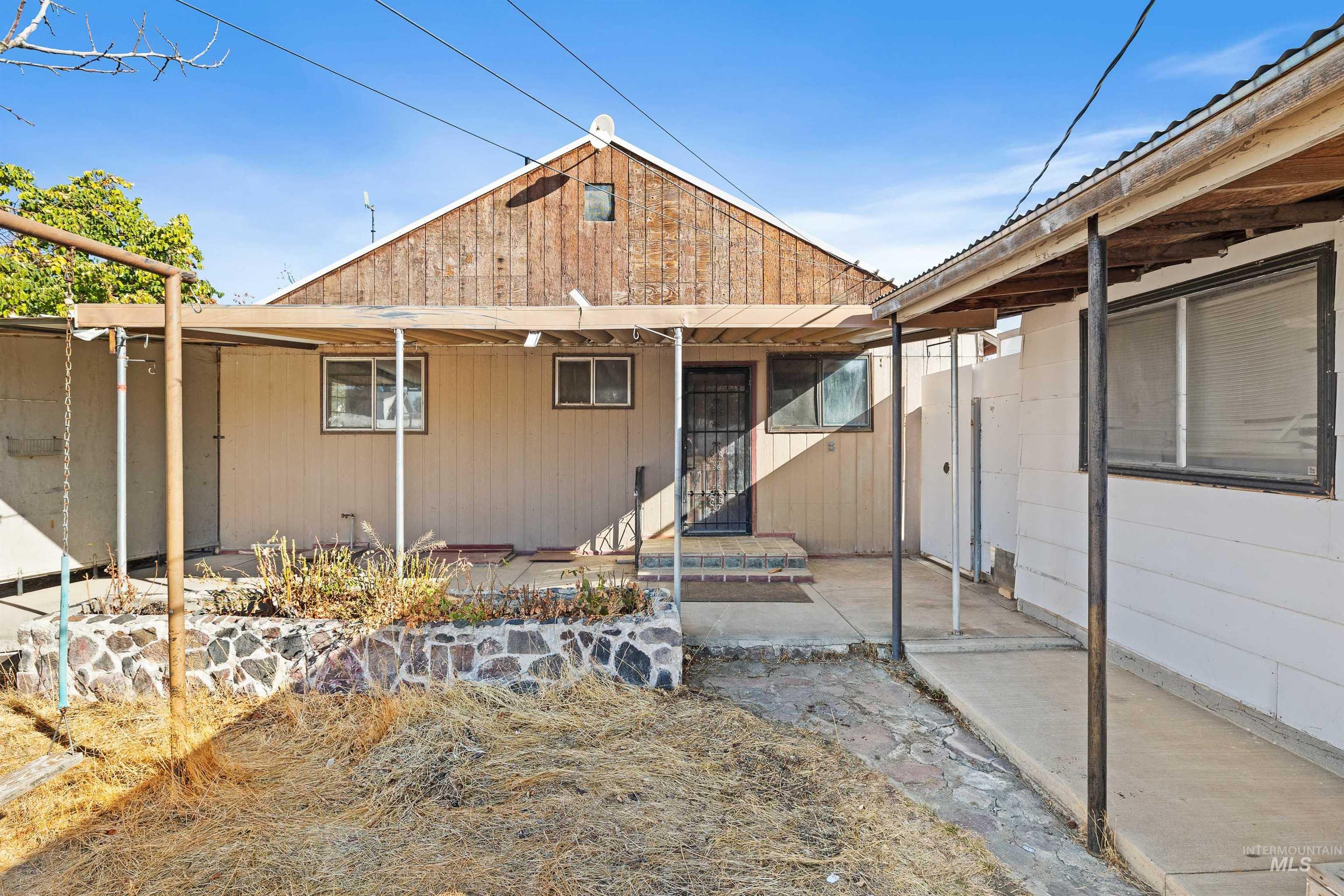 View of front of home featuring a patio area