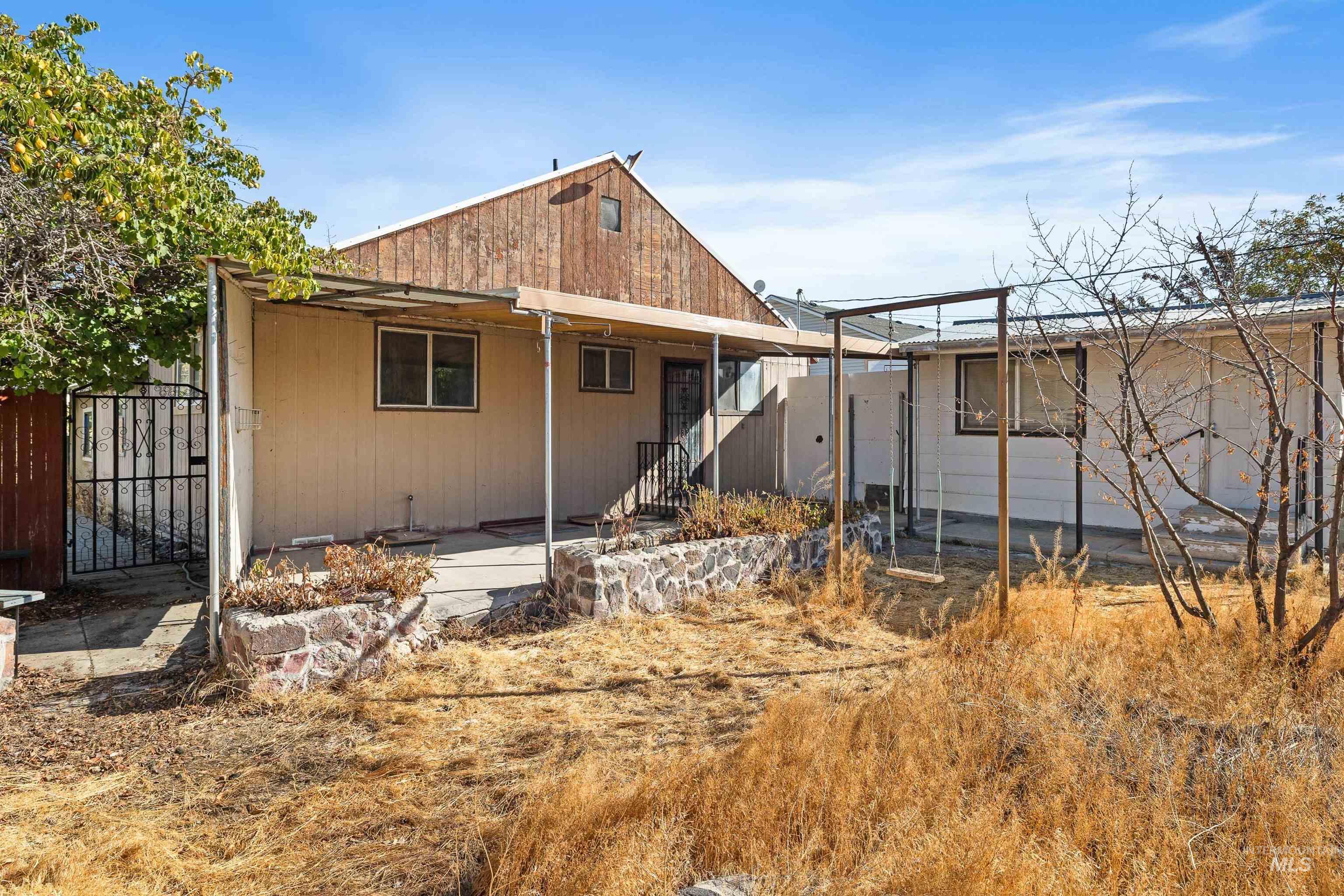 Rear view of house with a patio area