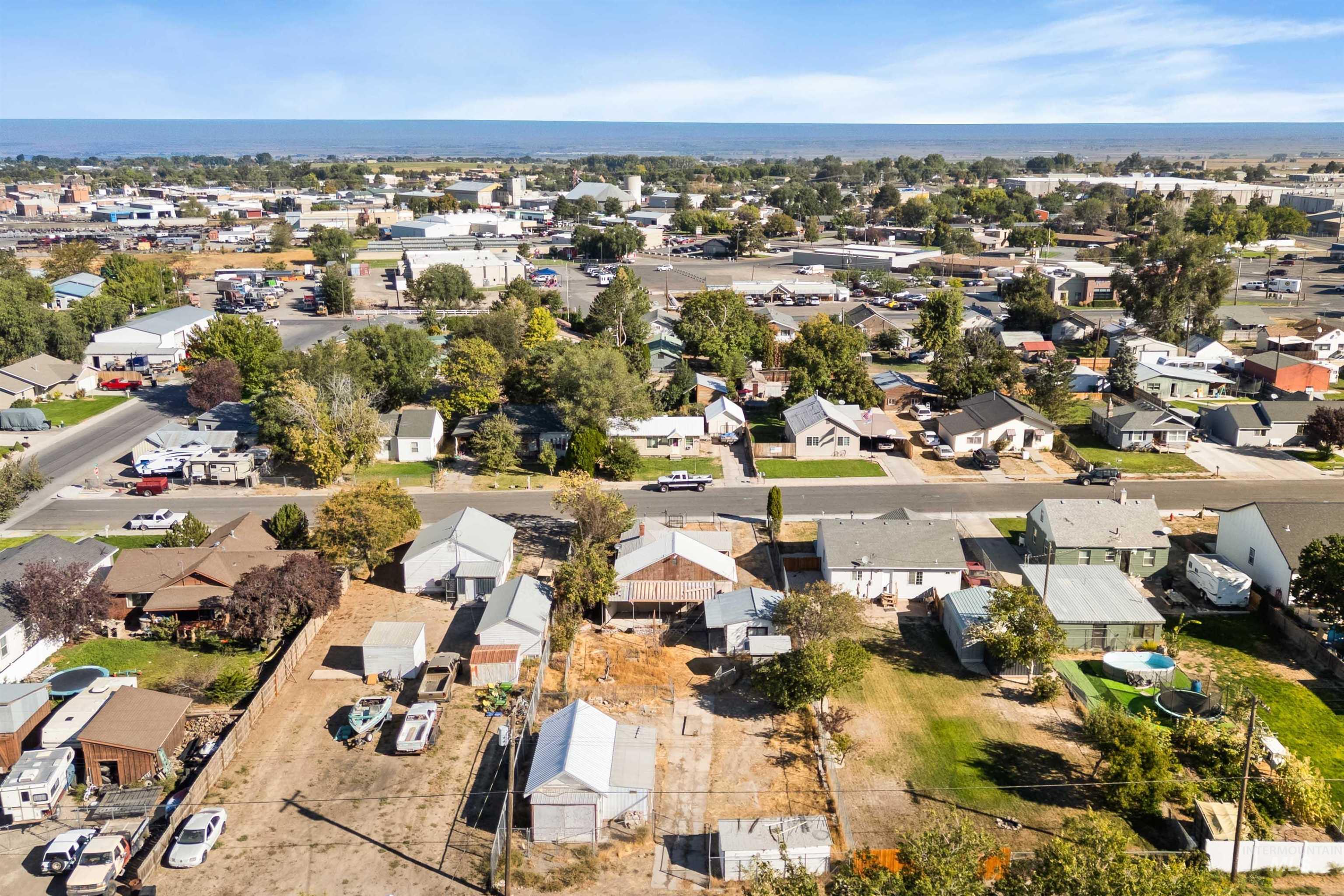Aerial view of property's location featuring nearby suburban area