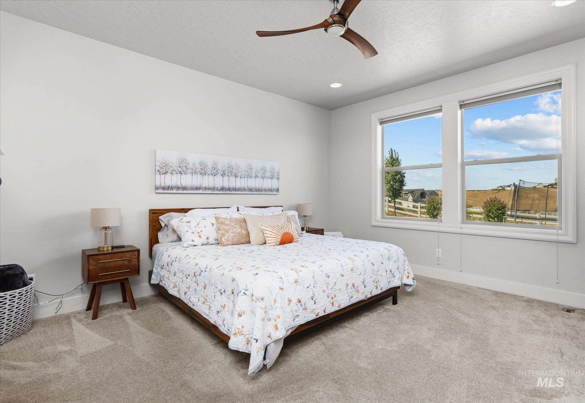 Bedroom featuring carpet flooring, recessed lighting, and ceiling fan