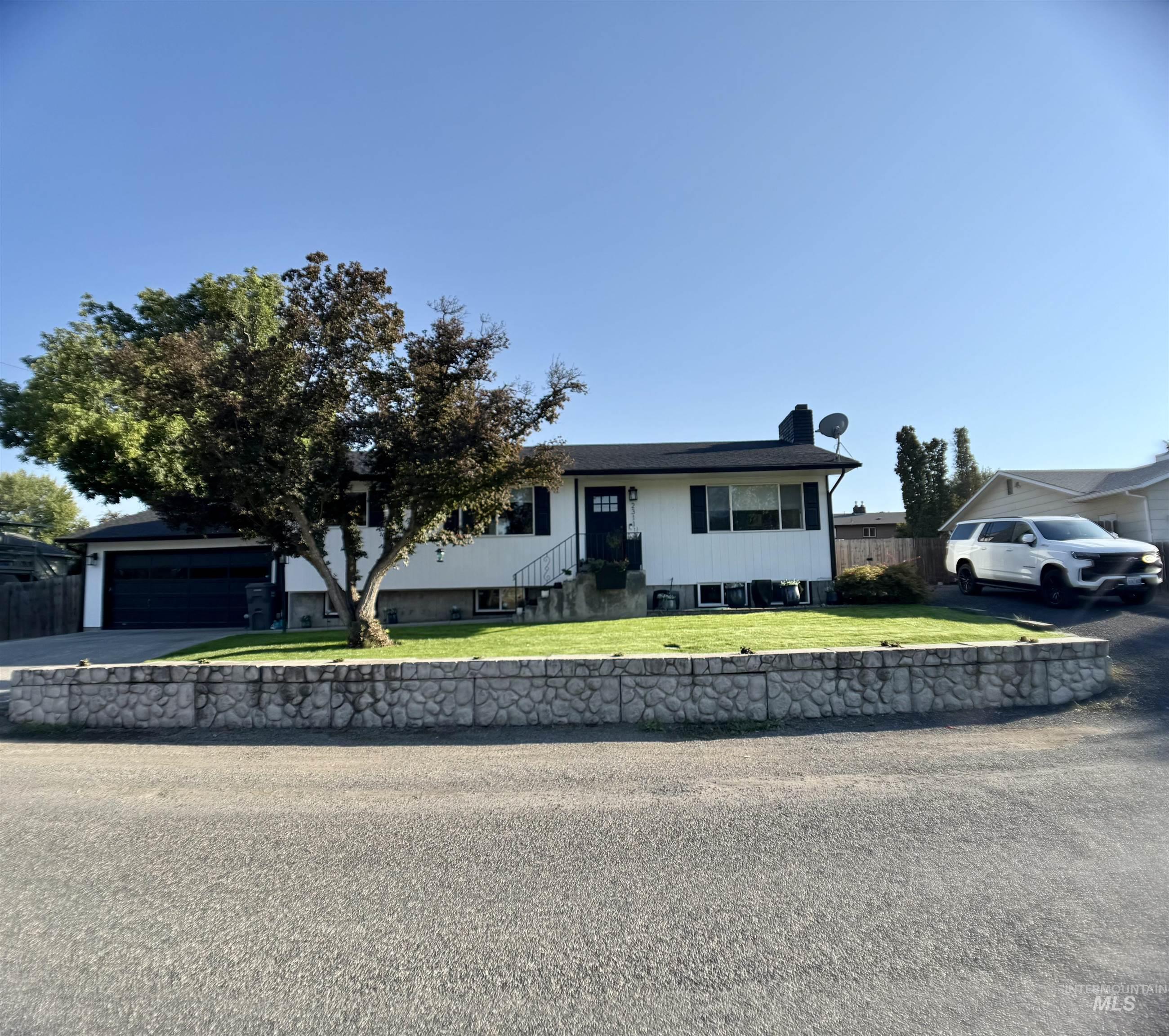 View of front of house featuring driveway