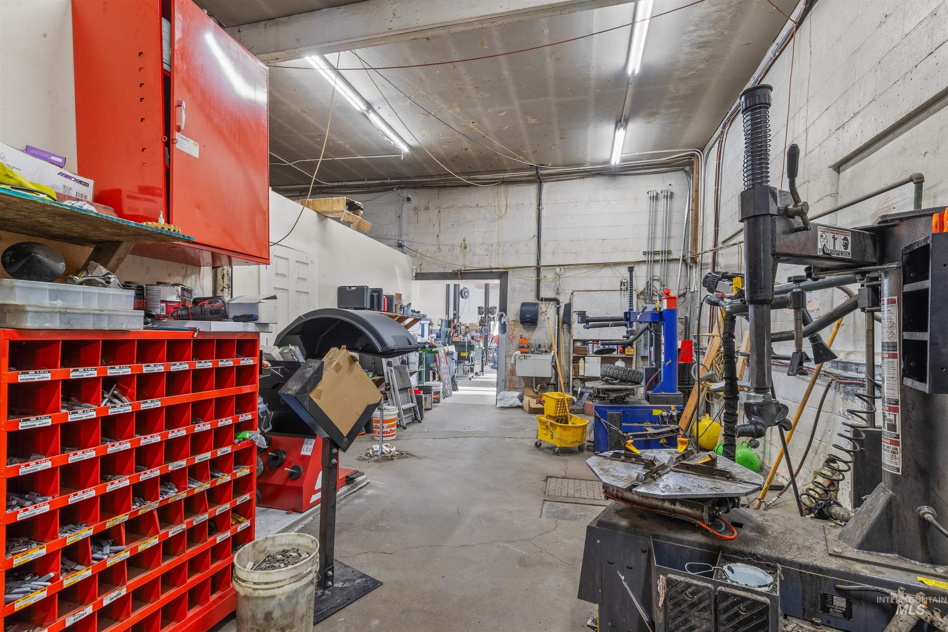Garage featuring water heater