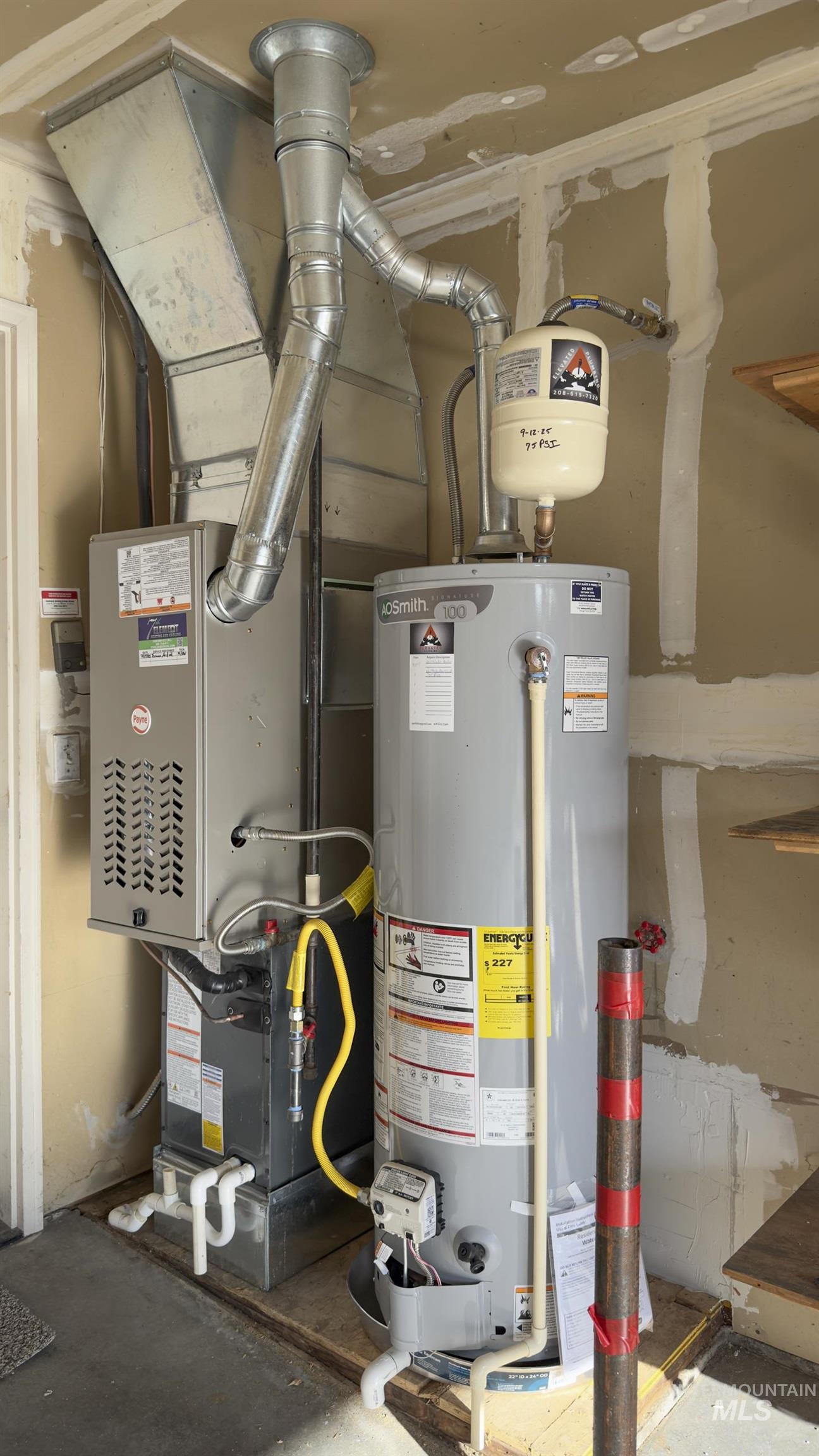 Utilities featuring gas water heater and heating unit