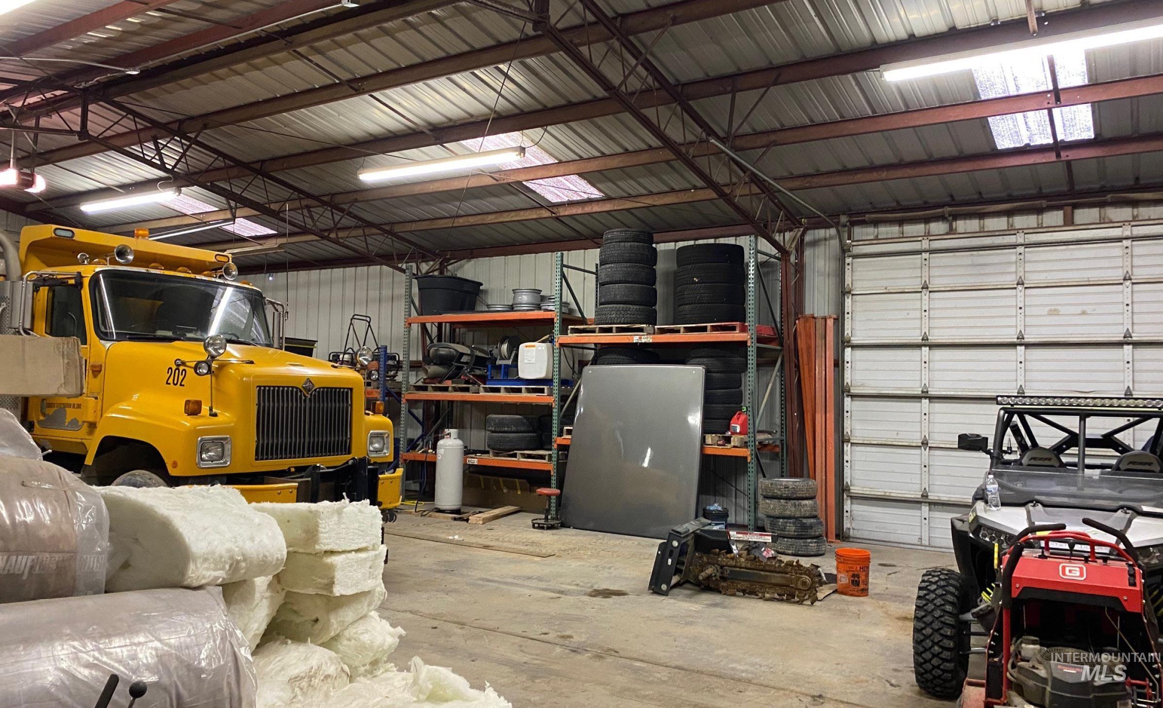 Garage with metal wall and a garage door opener