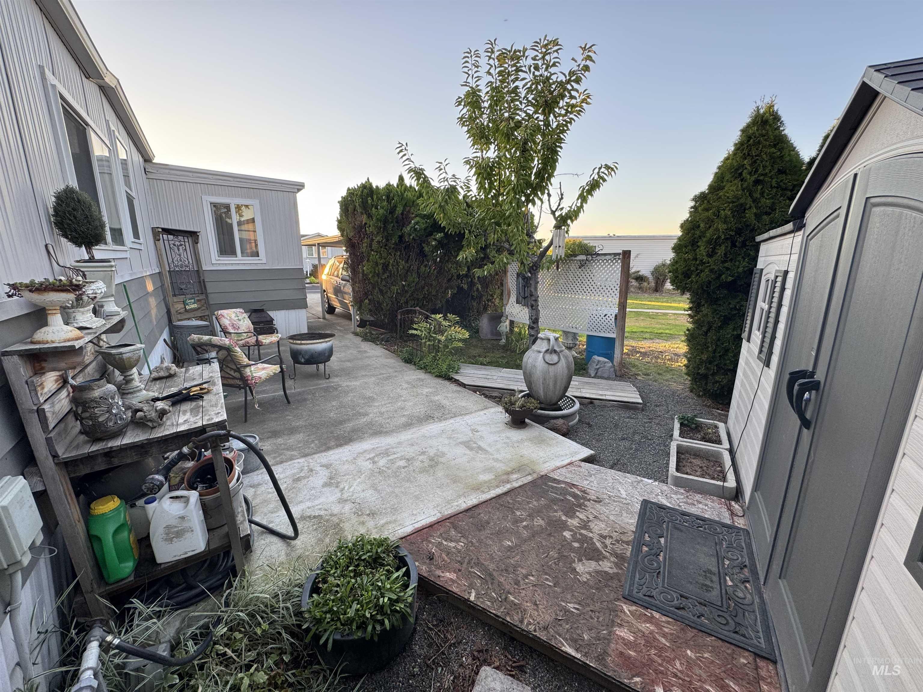 Patio terrace at dusk with a patio area