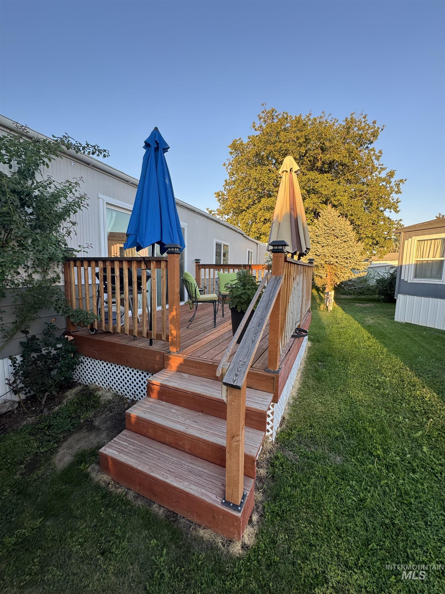 Deck featuring a yard