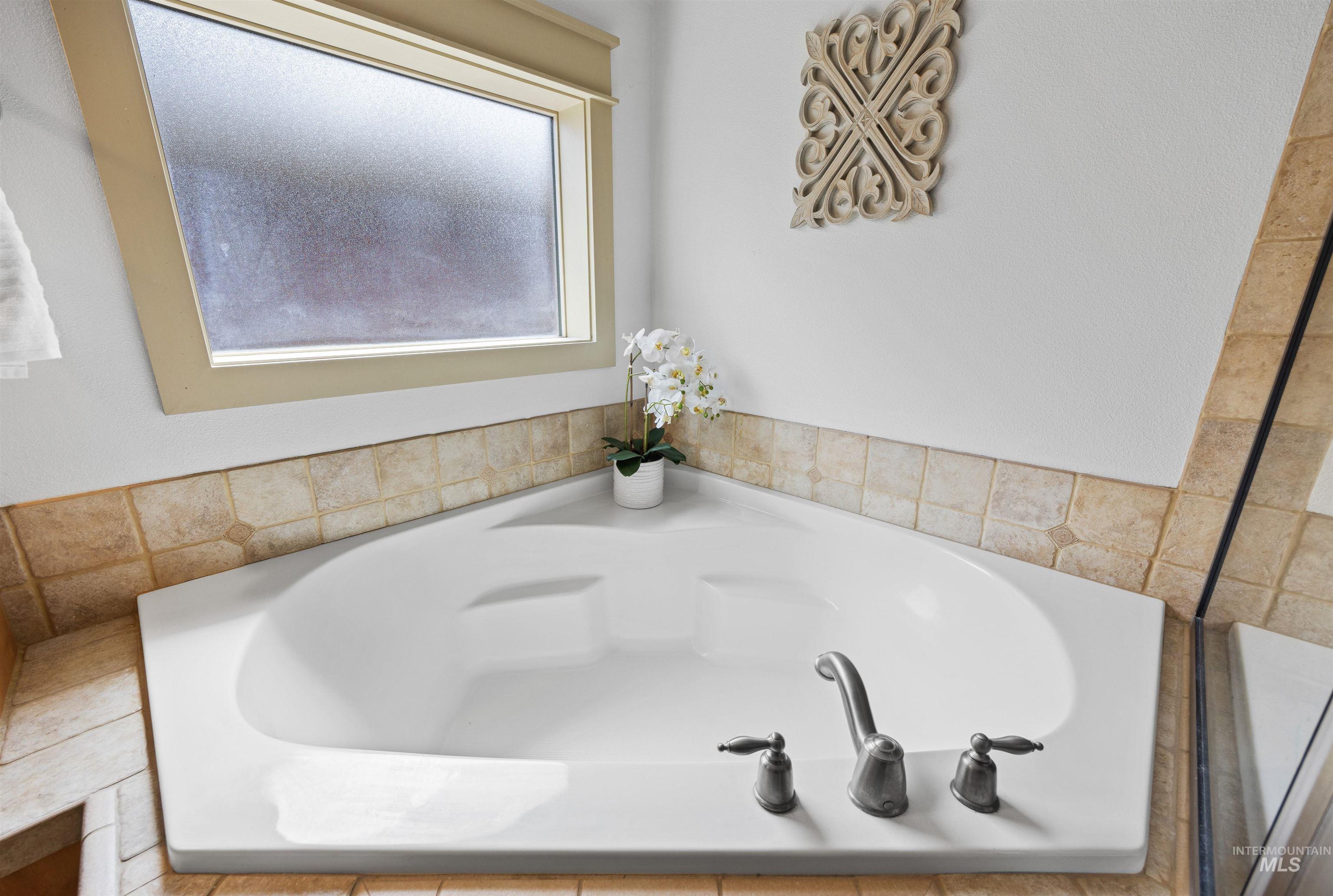 Bathroom featuring a garden tub