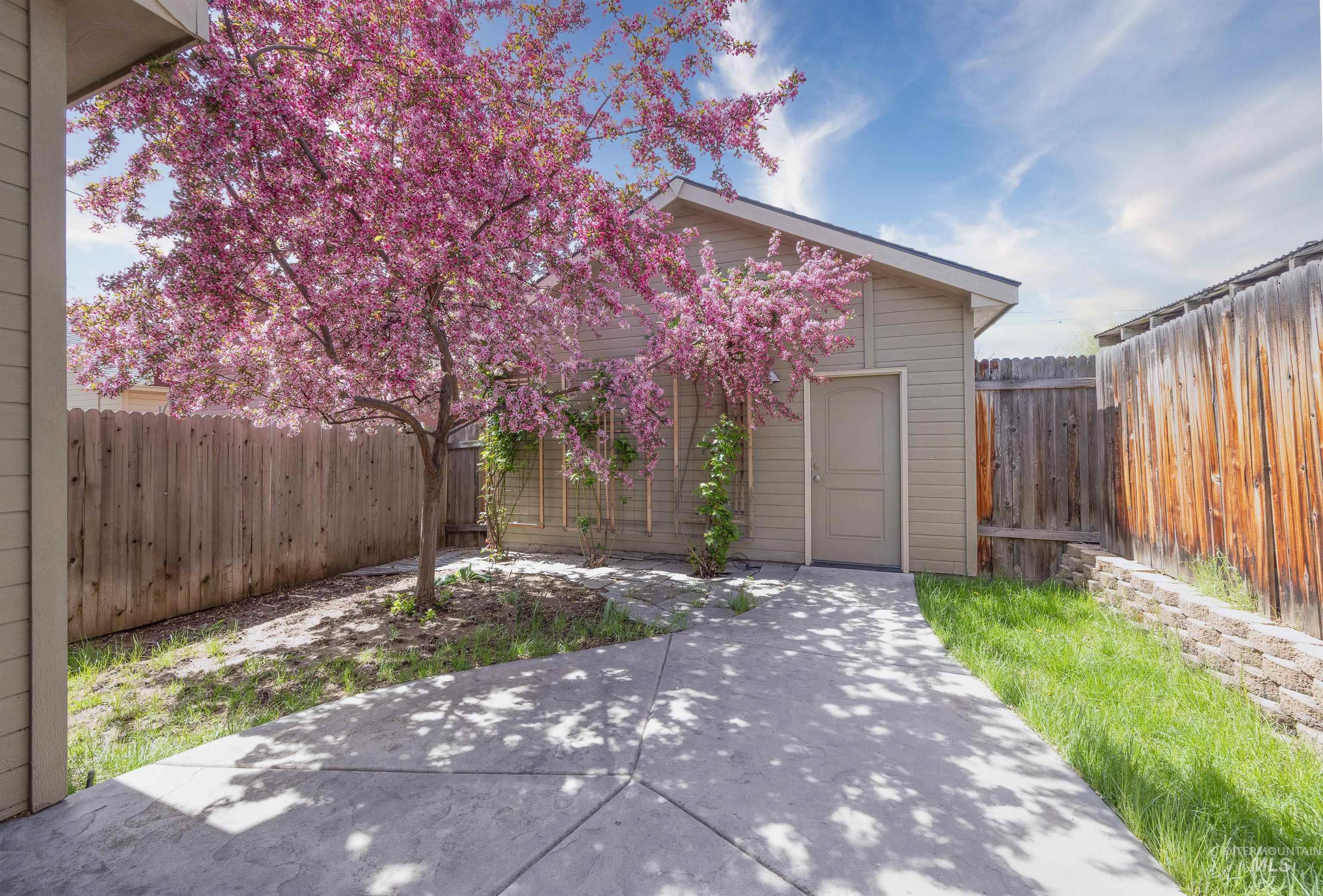 View of fenced backyard