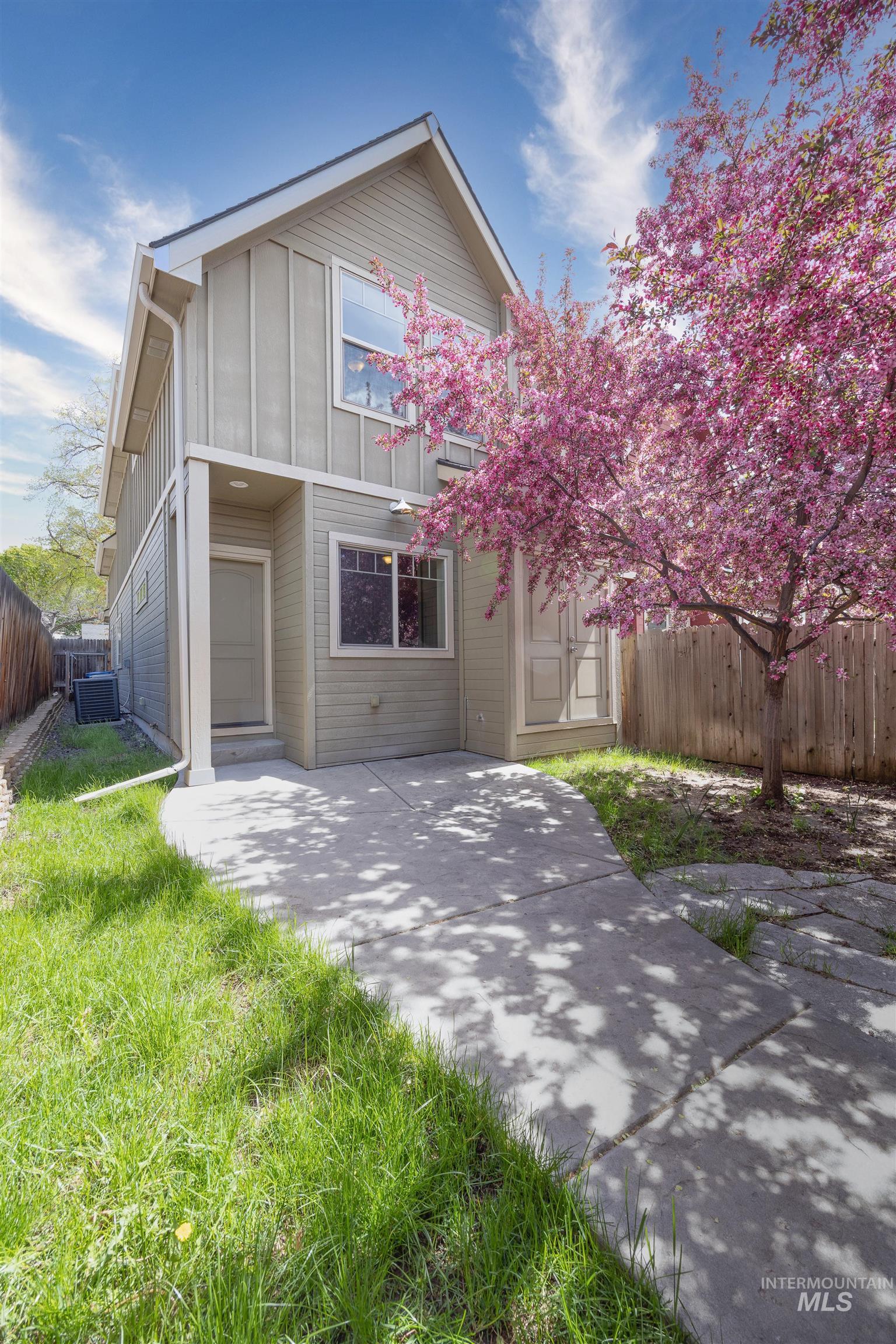 View of front of property with board and batten siding